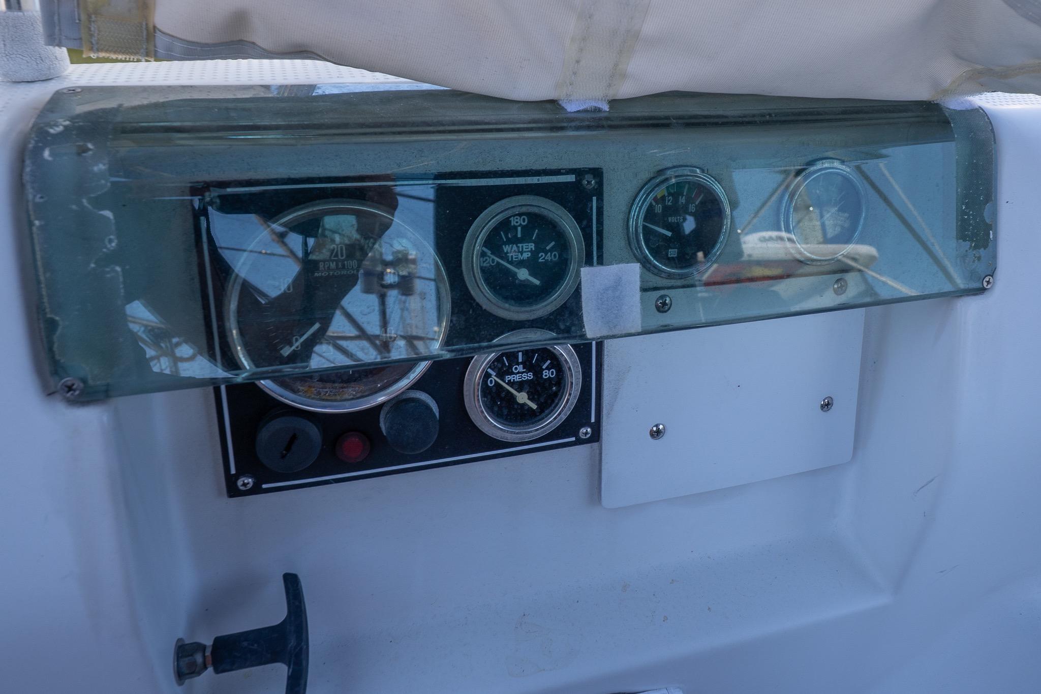 Instrument panel of a 1993 Beneteau First 38 s5 sailboat cockpit.