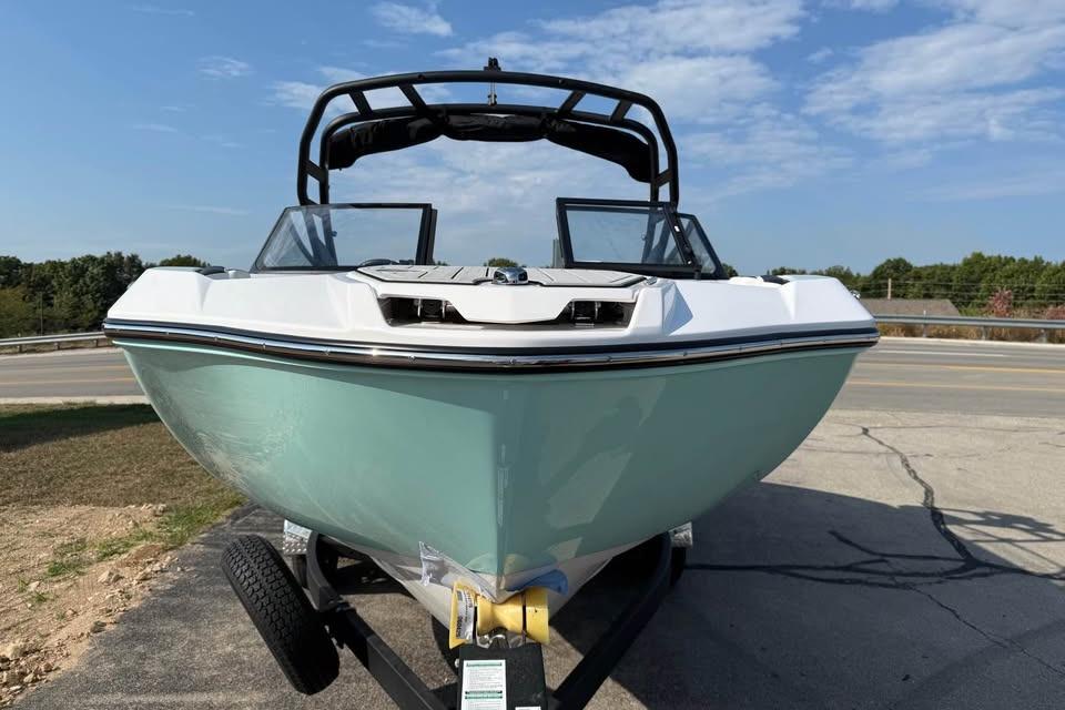 2026 Yamaha Boats 222S on trailer, sleek design, parked outdoors.