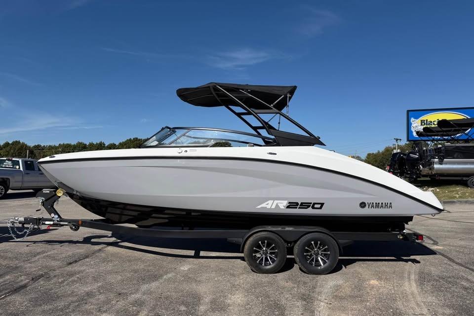 2026 Yamaha Boats AR250 on trailer under clear blue sky.