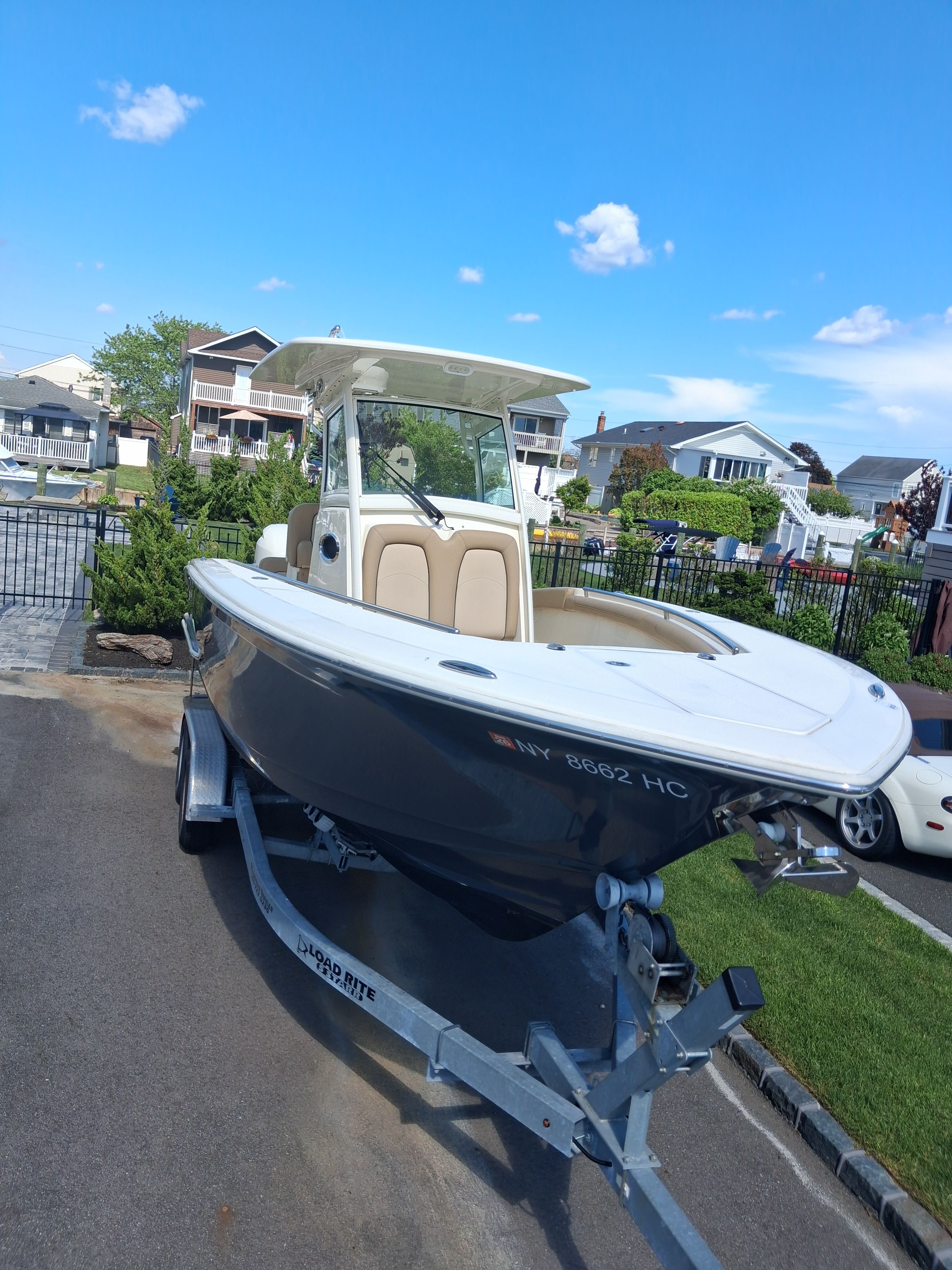 2018 Scout 255LXF boat on a trailer.