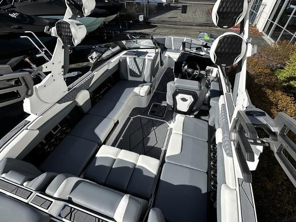 2025 Malibu M230 boat interior with sleek seating and modern design.