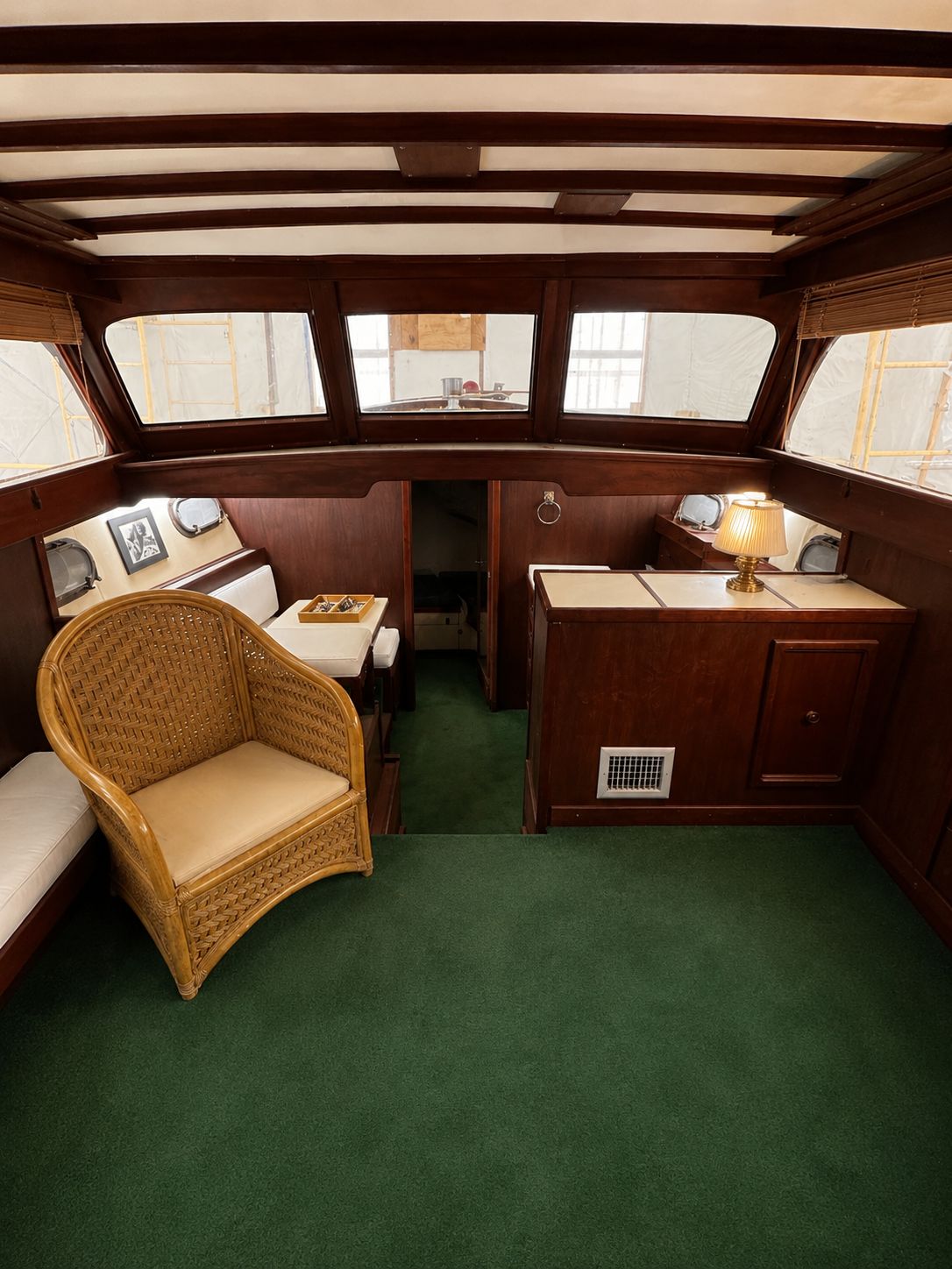 Interior of a 1951 Chris-Craft 50 Catalina yacht with wooden furnishings.