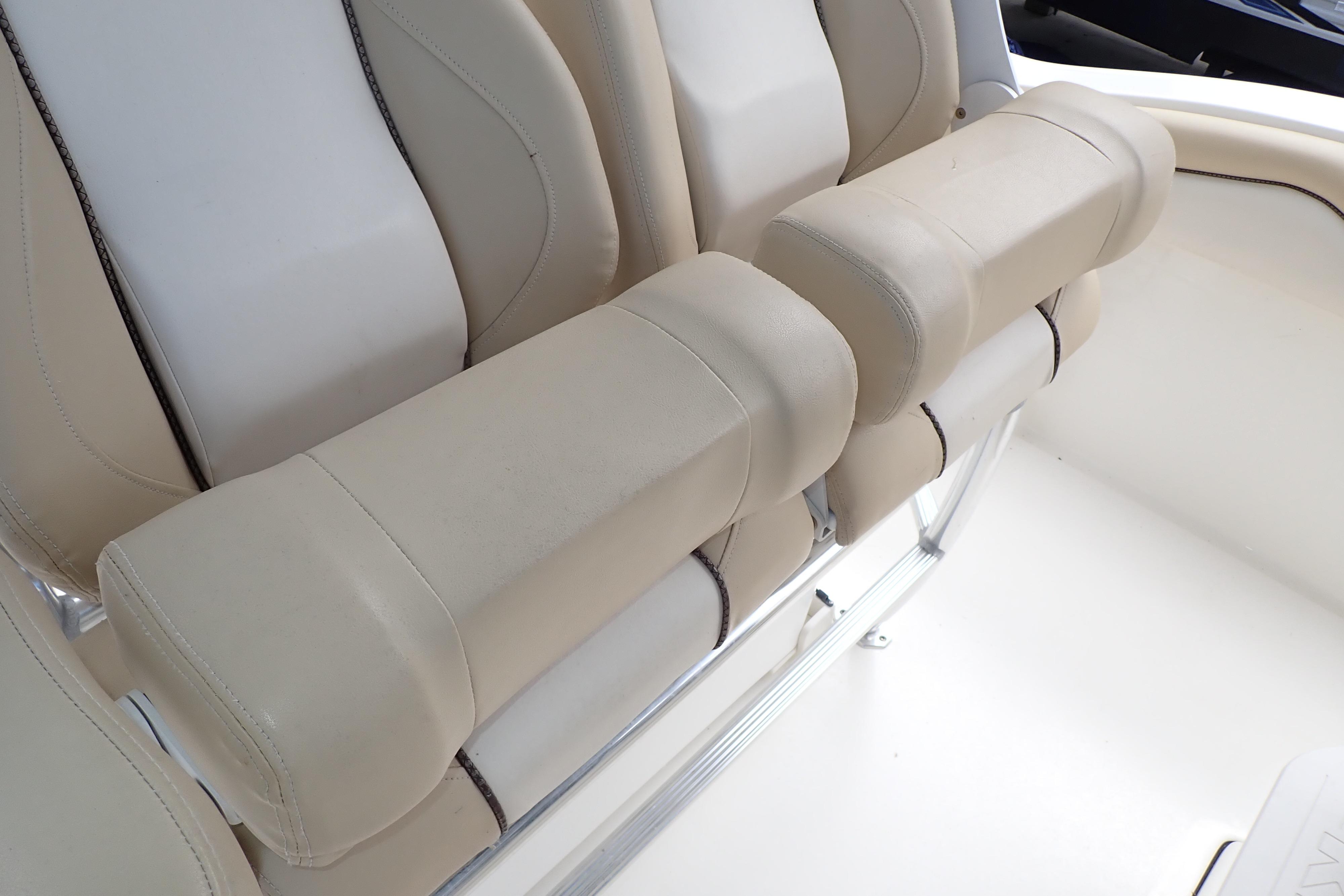 Beige seating on 2019 Key West 263 FS boat, showcasing comfortable design and craftsmanship.