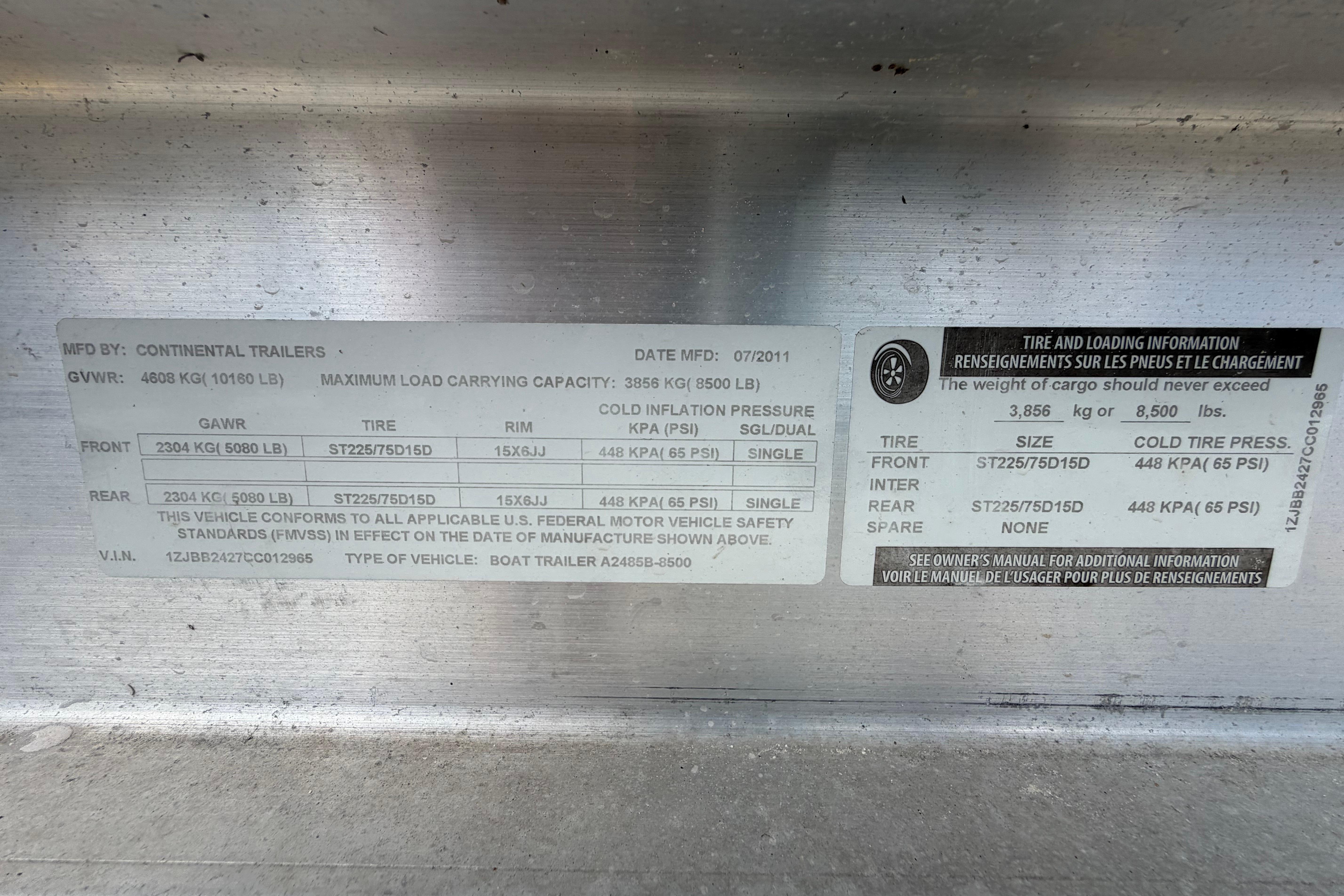 Label on Continental Trailers boat trailer, detailing tire and load specifications.
