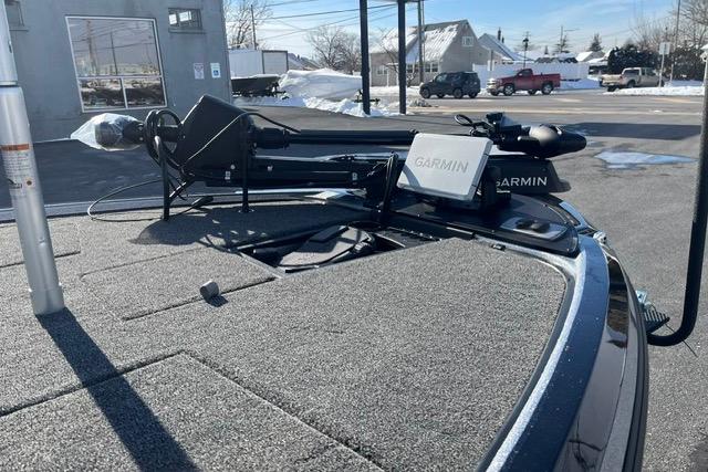 2026 Nitro Z19 XL Pro boat with Garmin equipment on deck in a snowy urban setting.