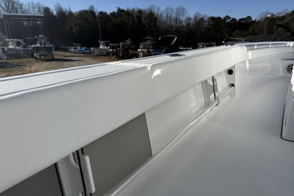 2026 Sportsman Masters 247OE Bay Boat interior, showcasing sleek white design and spacious deck.