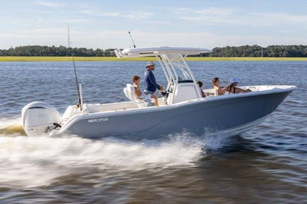 Manufacturer Provided Image: 2025 Sea Fox 248 Commander boat cruising on a sunny day with passengers onboard.