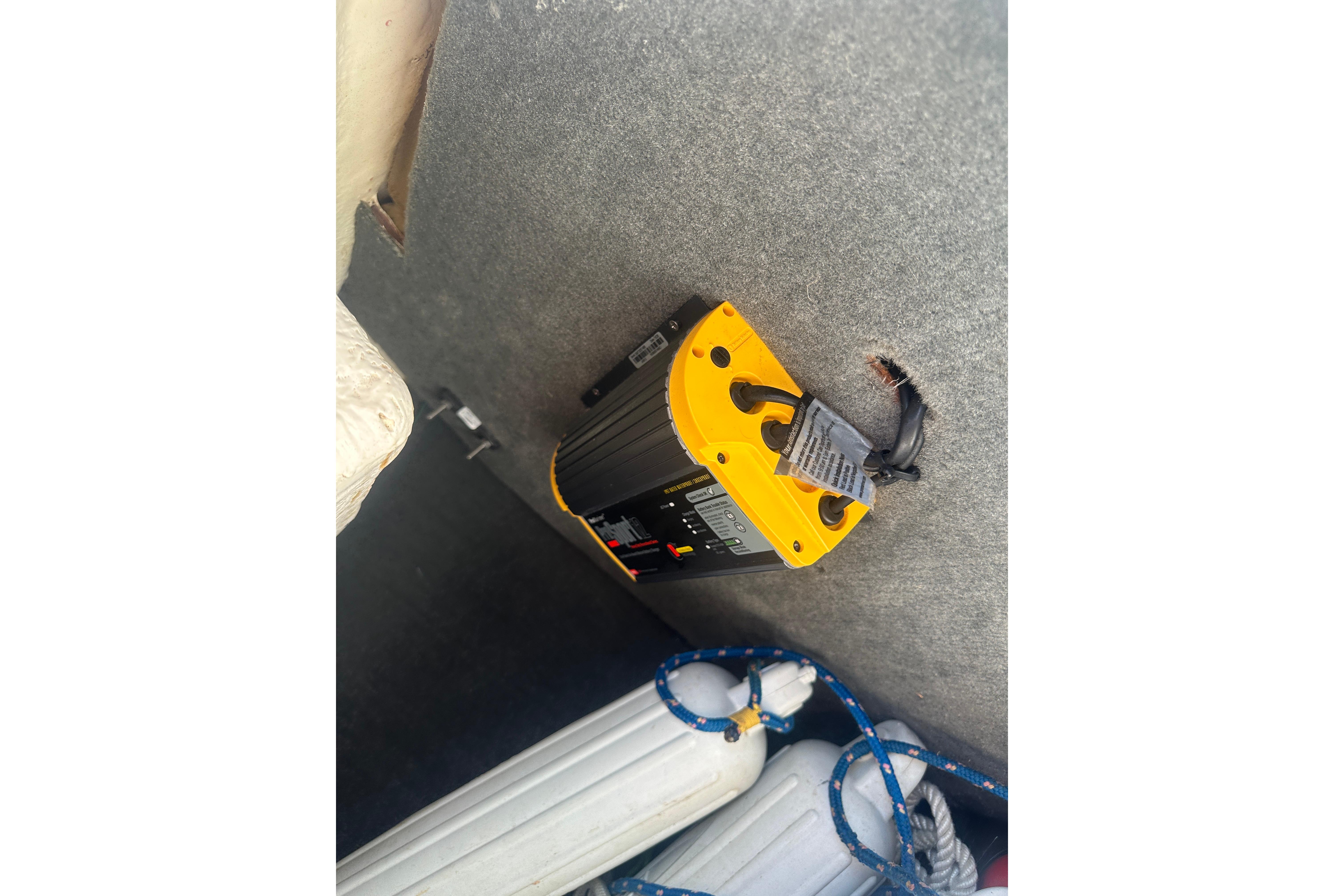 Yellow and black device on a 2017 Sea Ray SPX 190 Outboard boat interior.