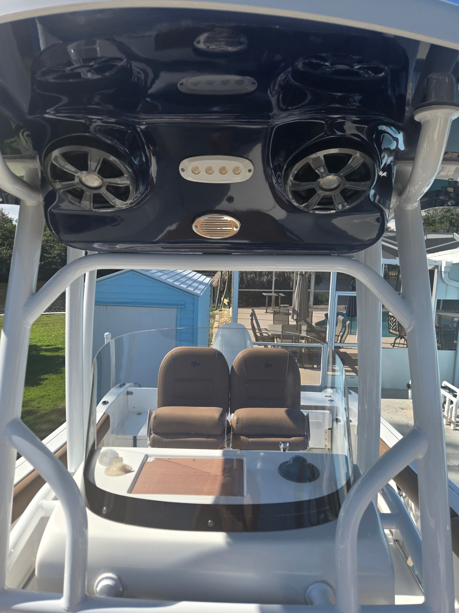 2018 Sea Pro 21.9 boat with speakers and seating.