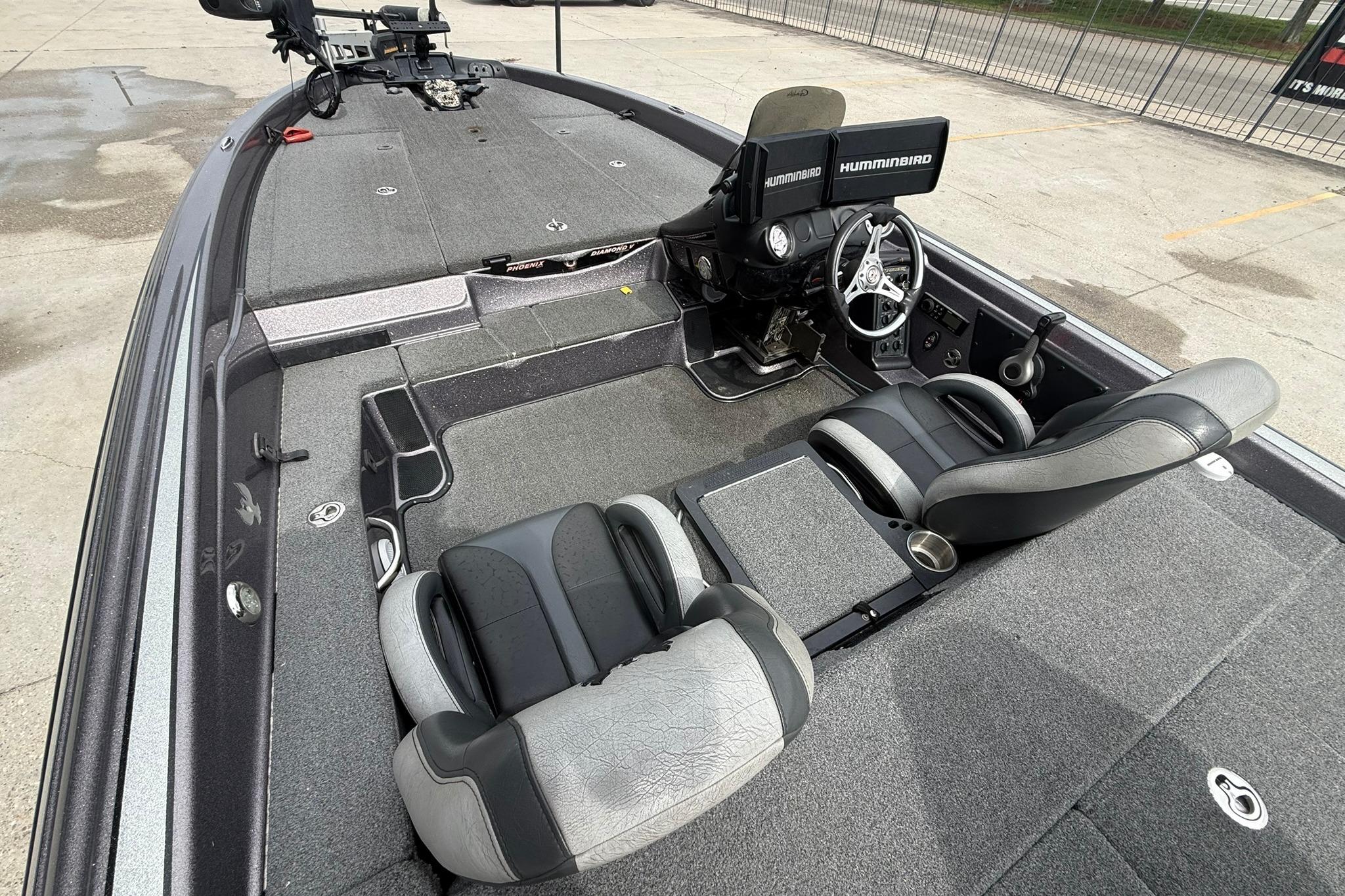 2018 Phoenix 919 ProXP boat interior with dual seats and Humminbird electronics.