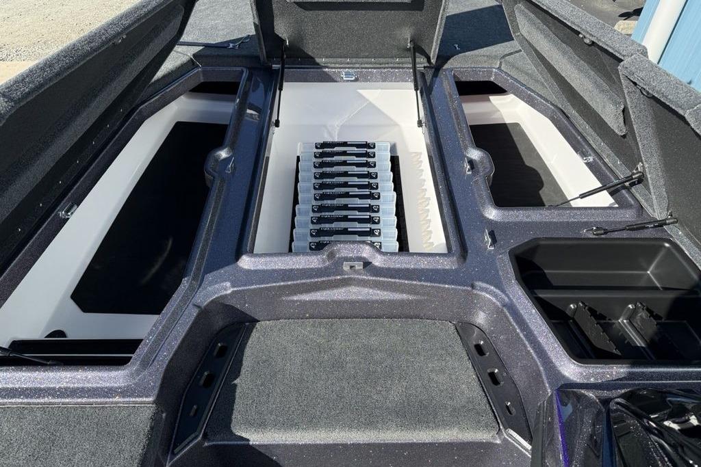 2026 Skeeter ZXE21 boat interior with open storage compartments and organized tackle trays.