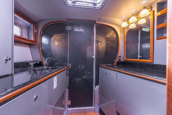 Luxurious bathroom interior of 2025 Shuttleworth 52 AeroRig yacht with modern fixtures and elegant design.