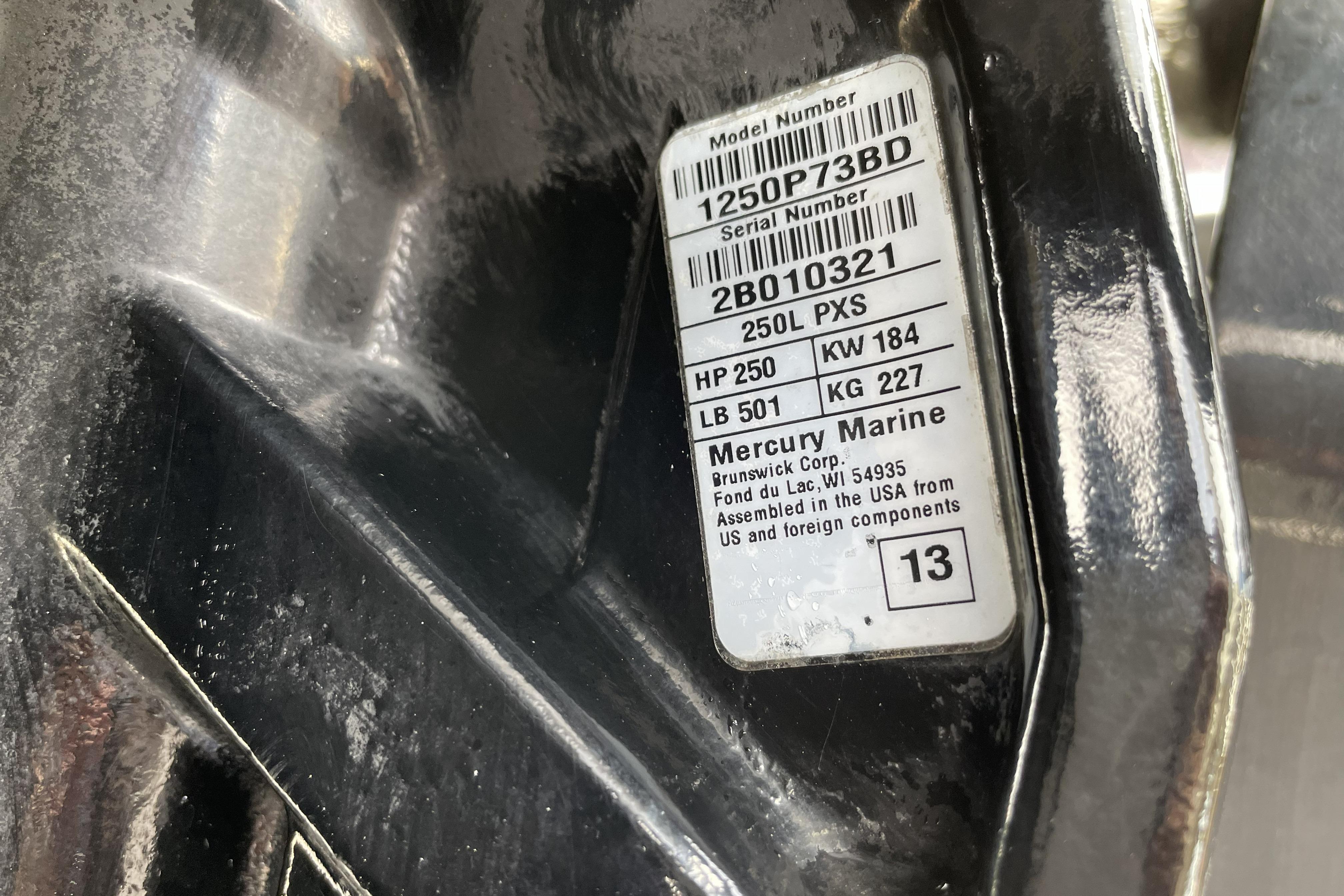 Label on Mercury Marine engine, model 250L PXS, with specifications and serial number.