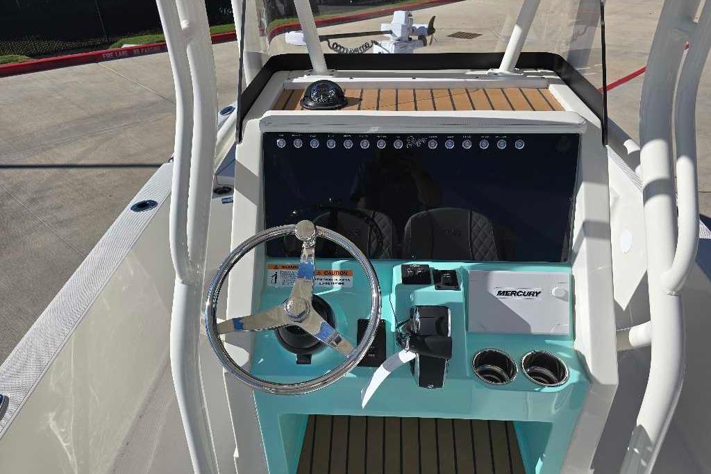 2025 Ranger 2510 Bay boat dashboard with steering wheel and Mercury controls.