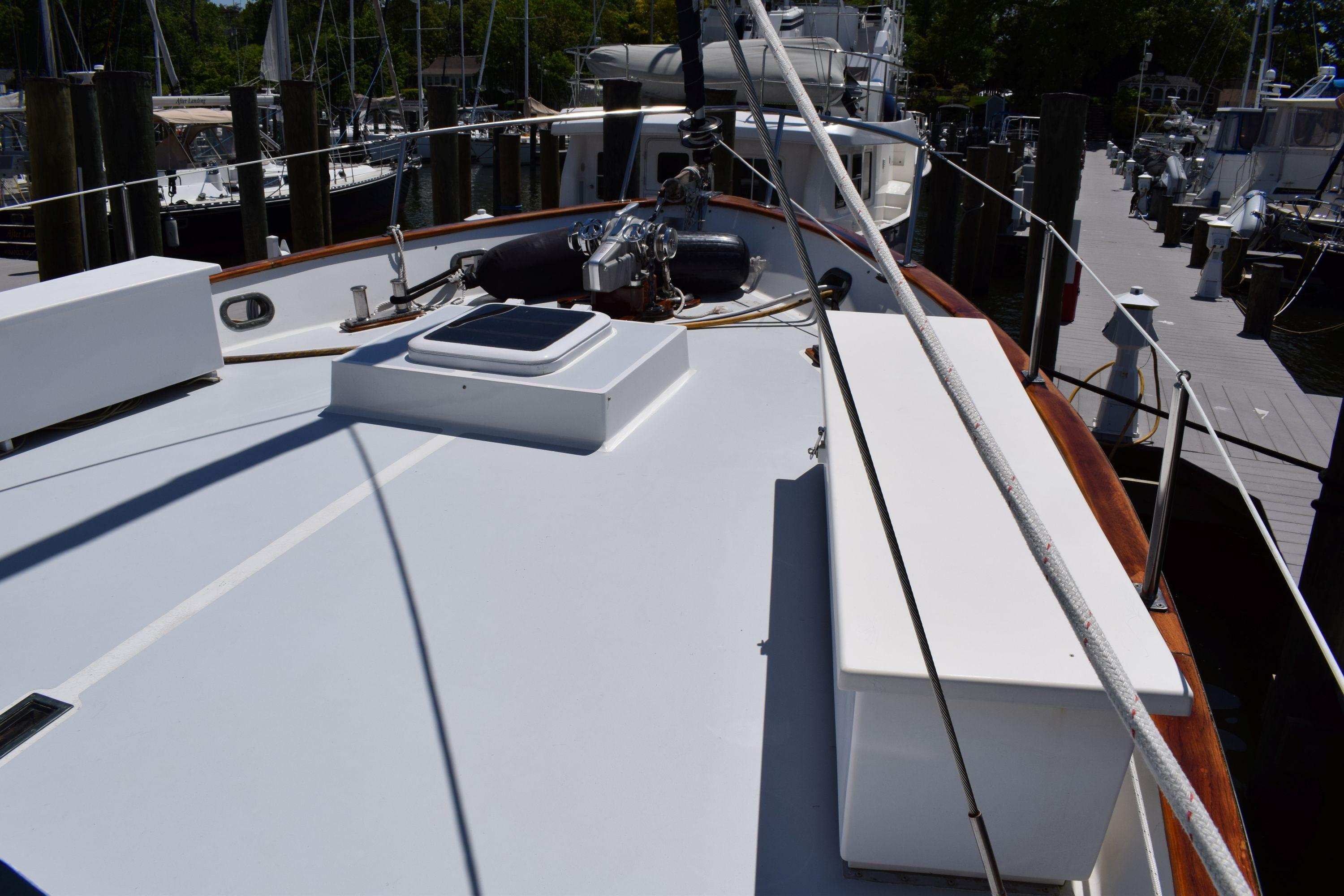 1980 Cheoy Lee 52 Motorsailer deck view at marina.