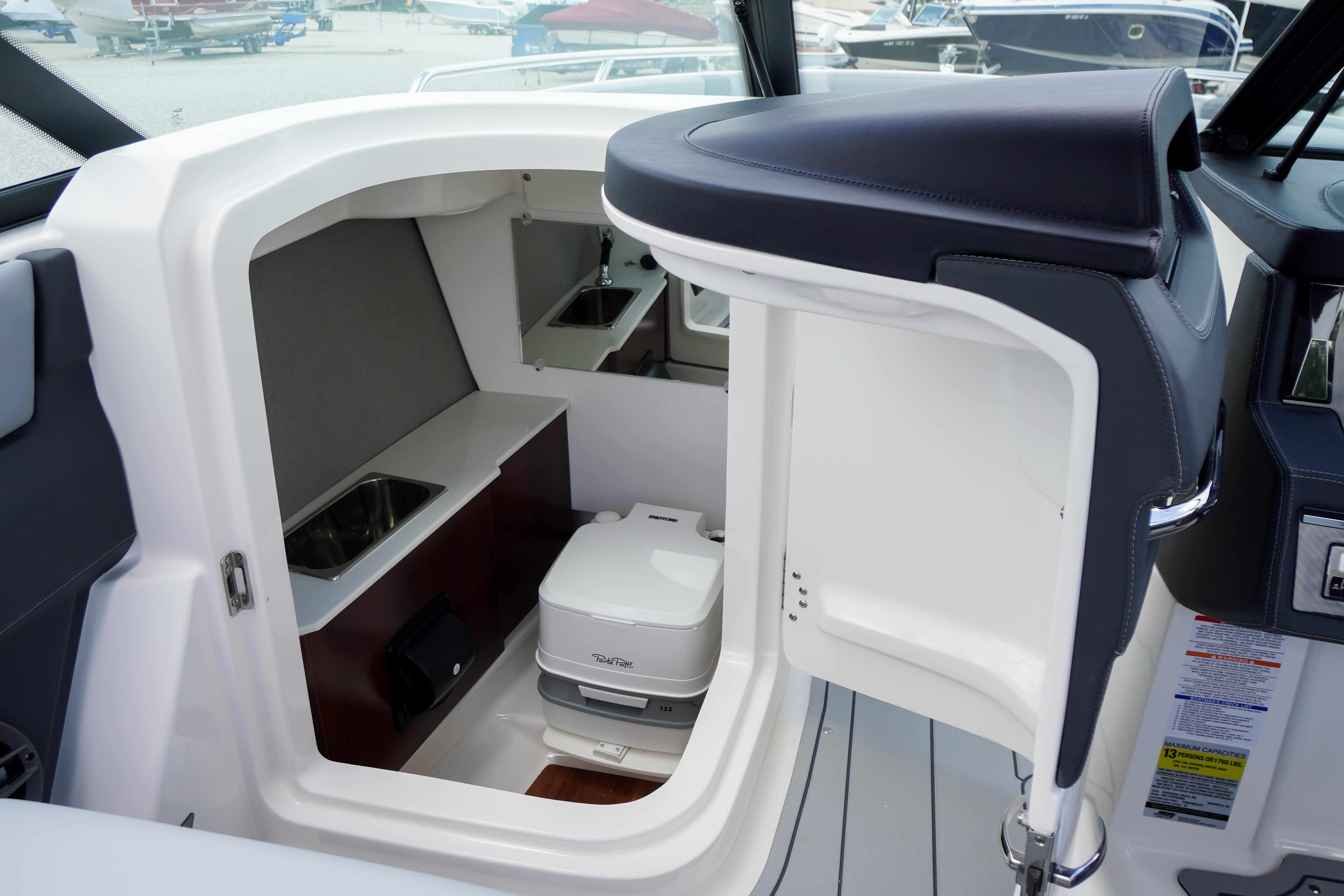 2026 Chaparral SSX 4 boat interior with compact cabin and modern amenities.