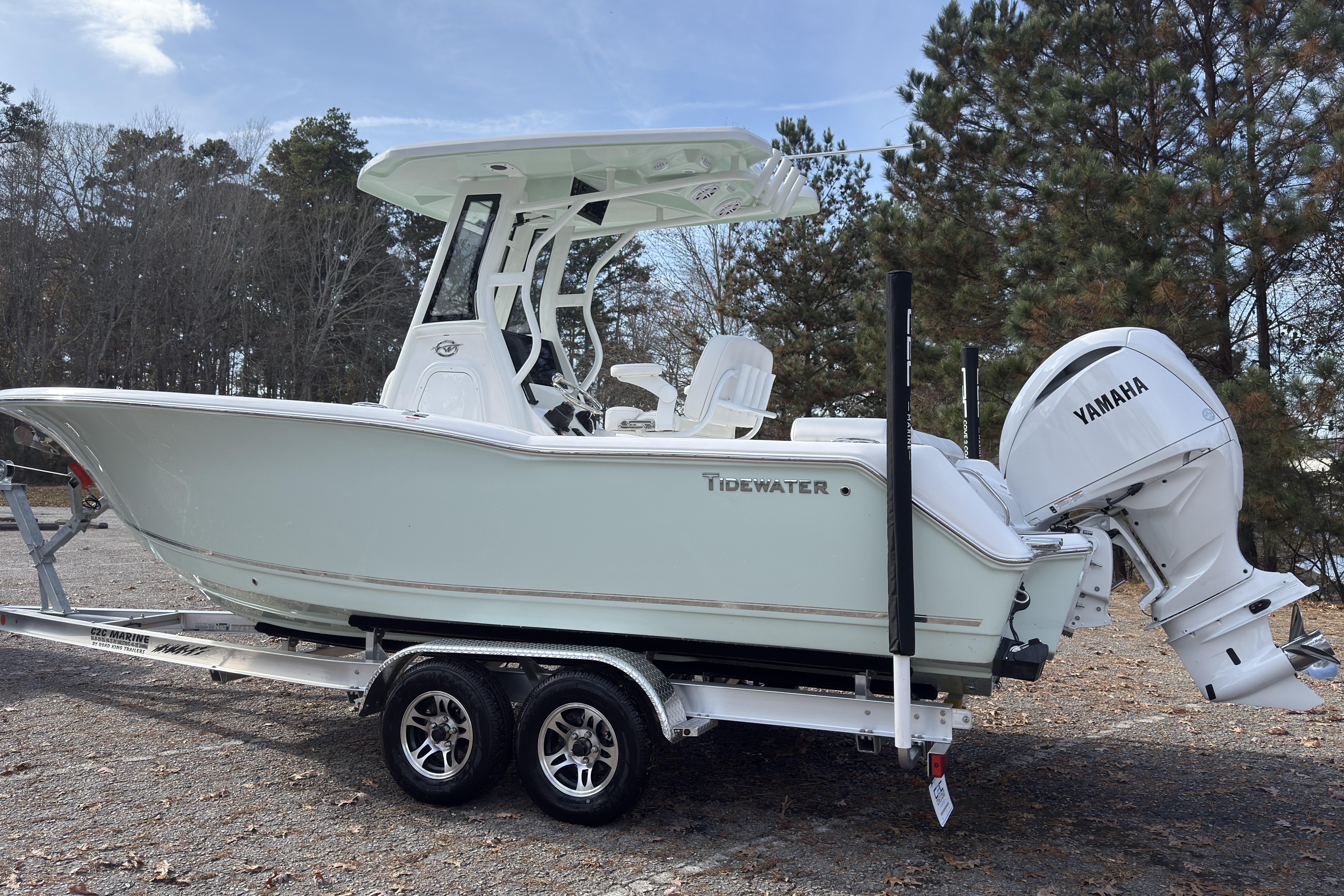 2026 Tidewater 232 LXF boat on trailer with Yamaha engine, parked outdoors.