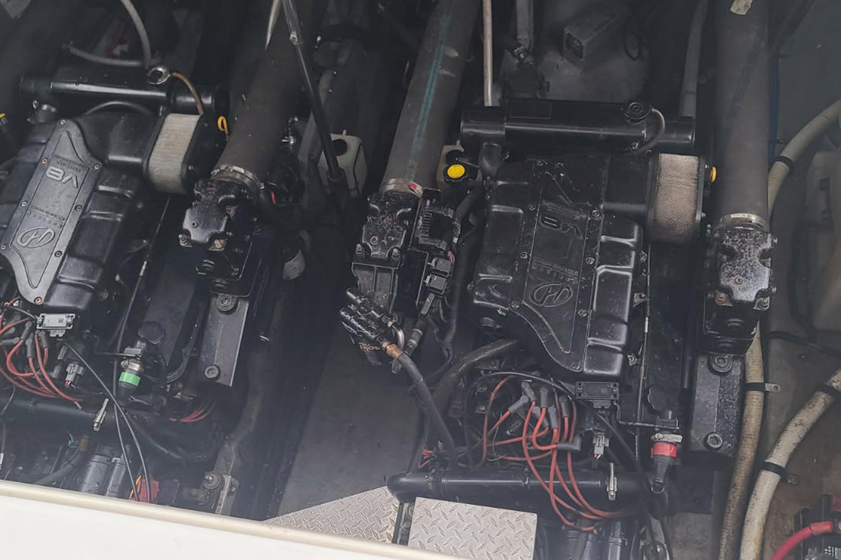Engine compartment of a 1998 Sea Ray Sundancer 400 boat, showing detailed machinery.