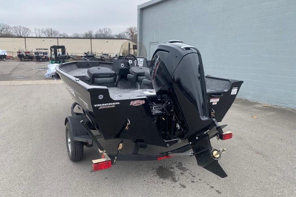 2026 Tracker Pro Guide V-16 SC boat with outboard motor on trailer.