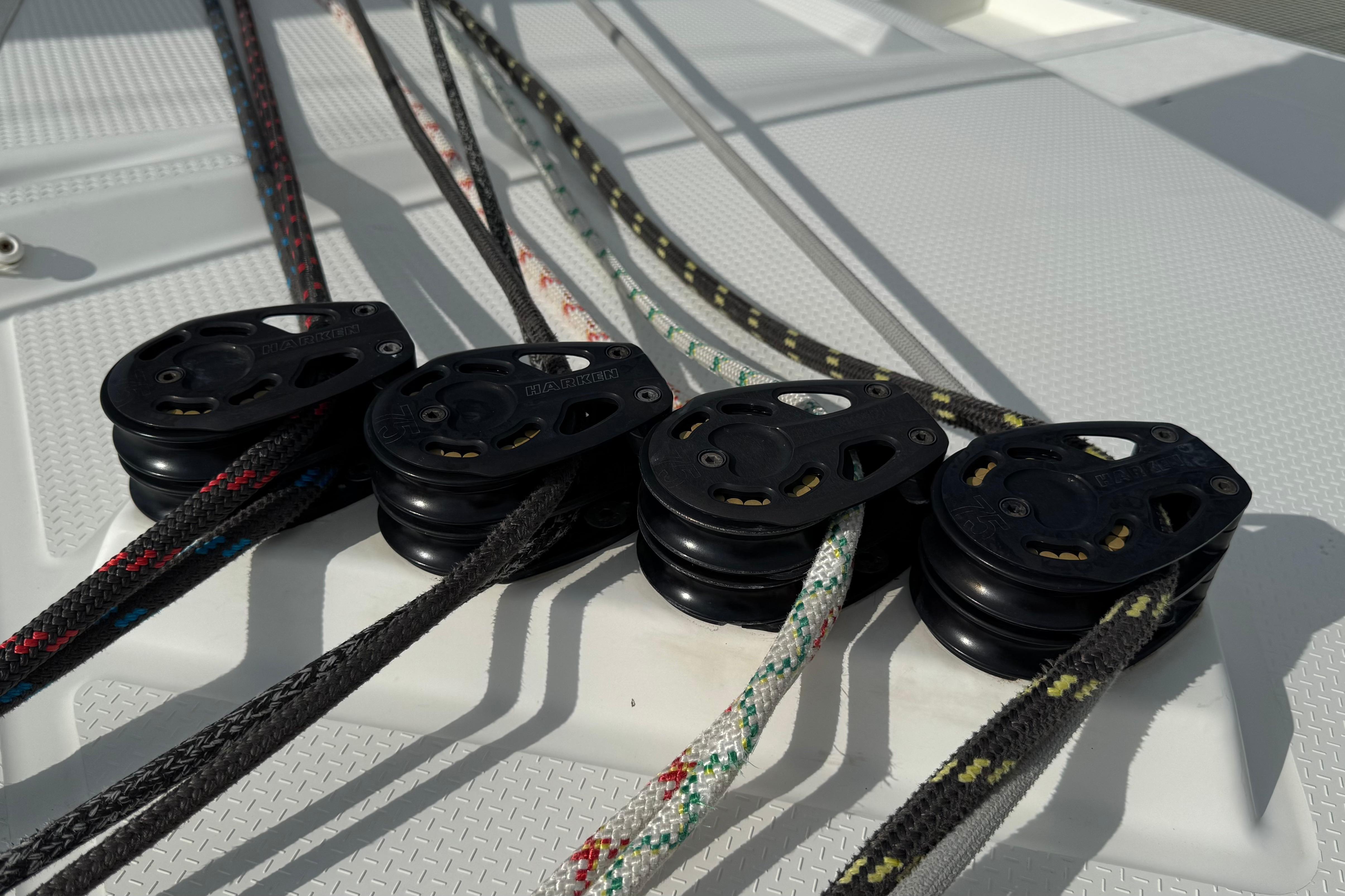 Close-up of sailing ropes and pulleys on a 2020 Fountaine Pajot Saona 47 catamaran.