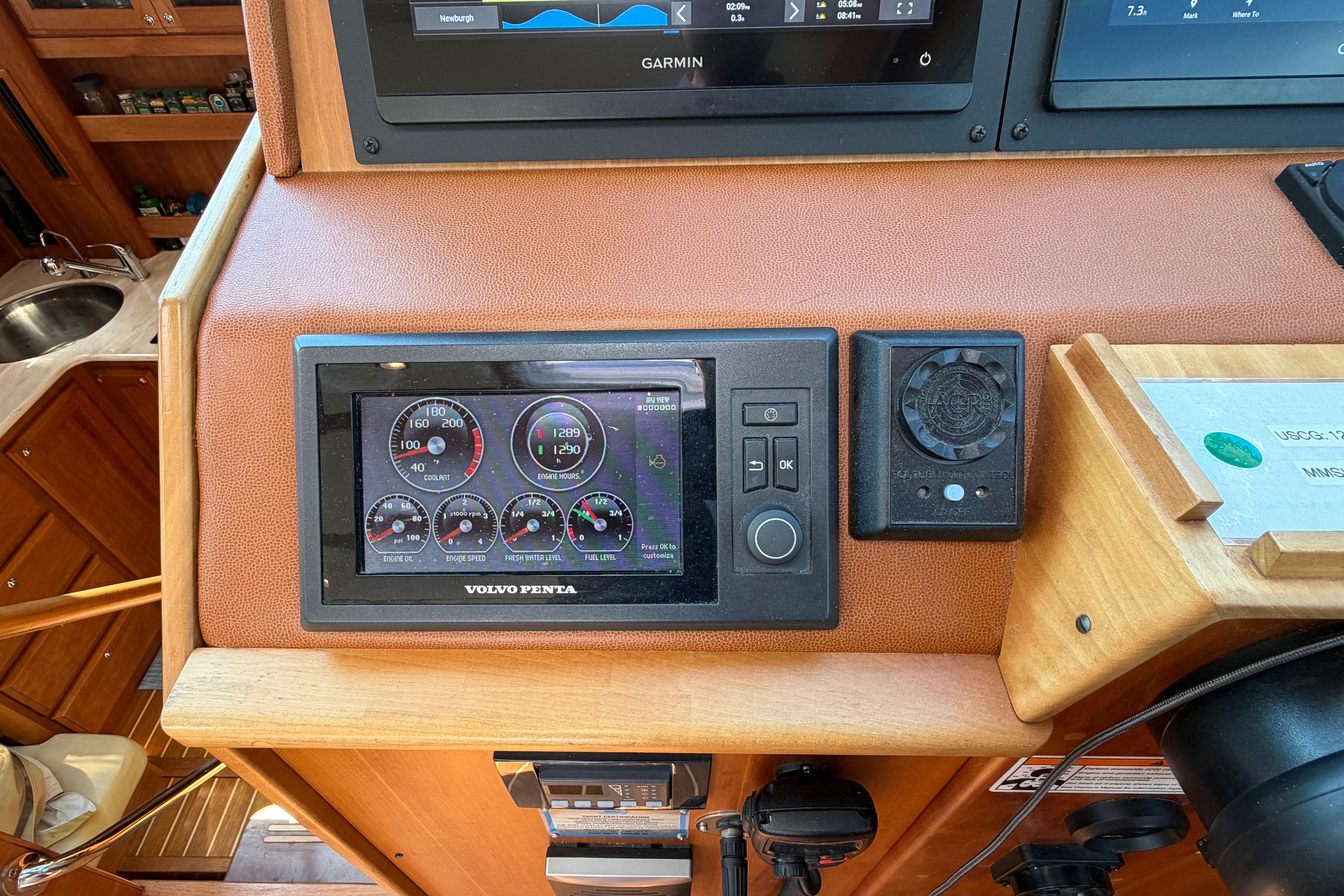Volvo Penta control panel on 2015 Sabre 38 Salon Express yacht dashboard.