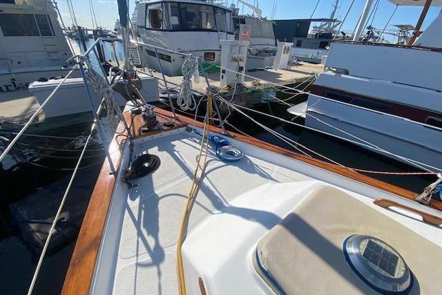 Sailboat deck view of 1982 Endeavour 40 docked at marina.