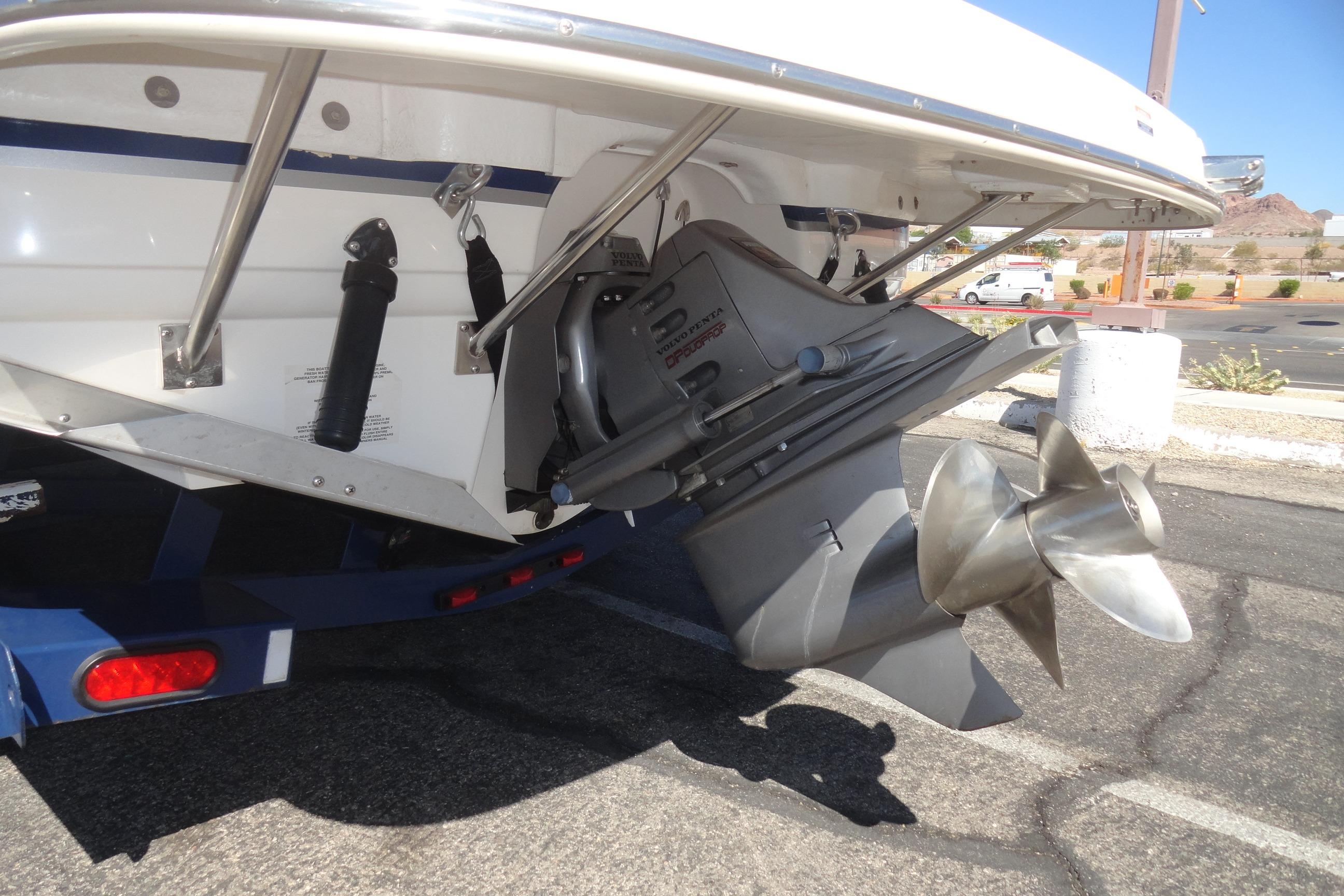 Rear view of a 2001 Chaparral 265 SSi boat with visible propeller and outdrive.