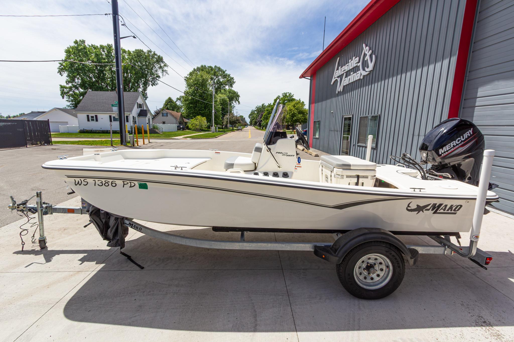 2020 Mako Pro Skiff 15 CC boat on trailer, parked outside Lakeside Marina.