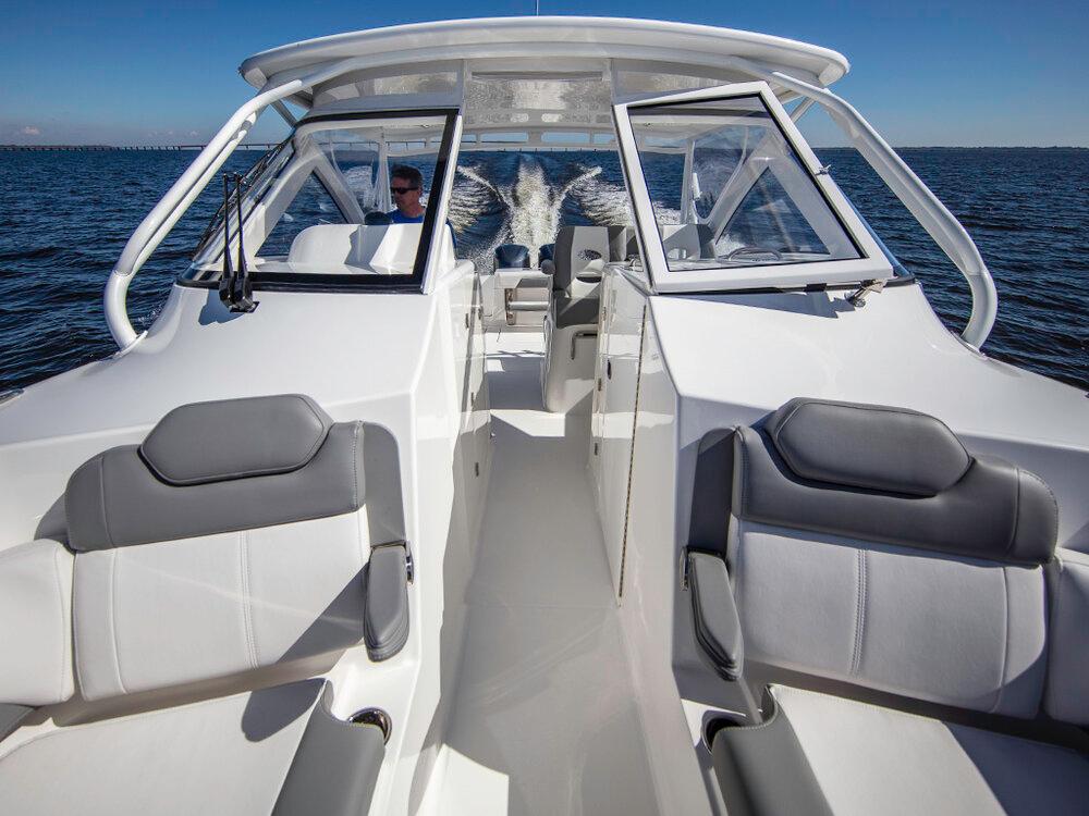 2025 Albemarle 31DC boat cruising on open water.