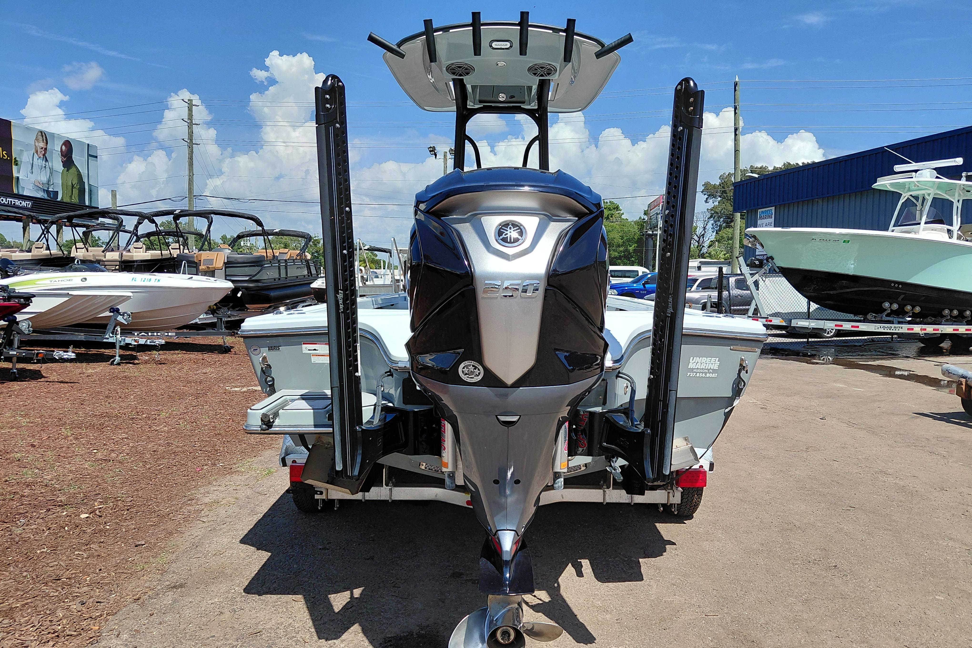 2022 Pathfinder 2300 HPS boat with Yamaha engine, displayed outdoors on a sunny day.