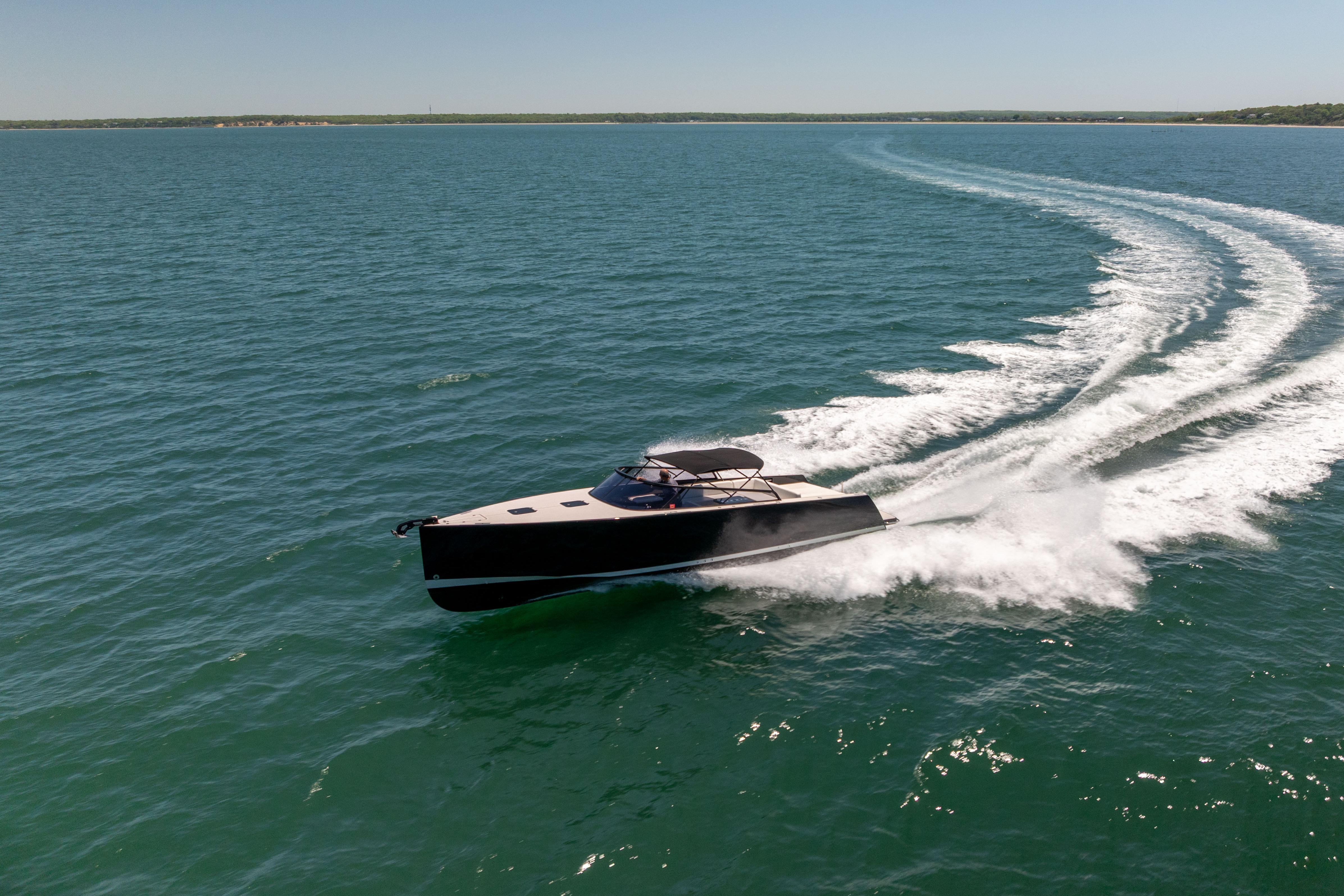 2016 VanDutch 40 yacht cruising swiftly on open water.