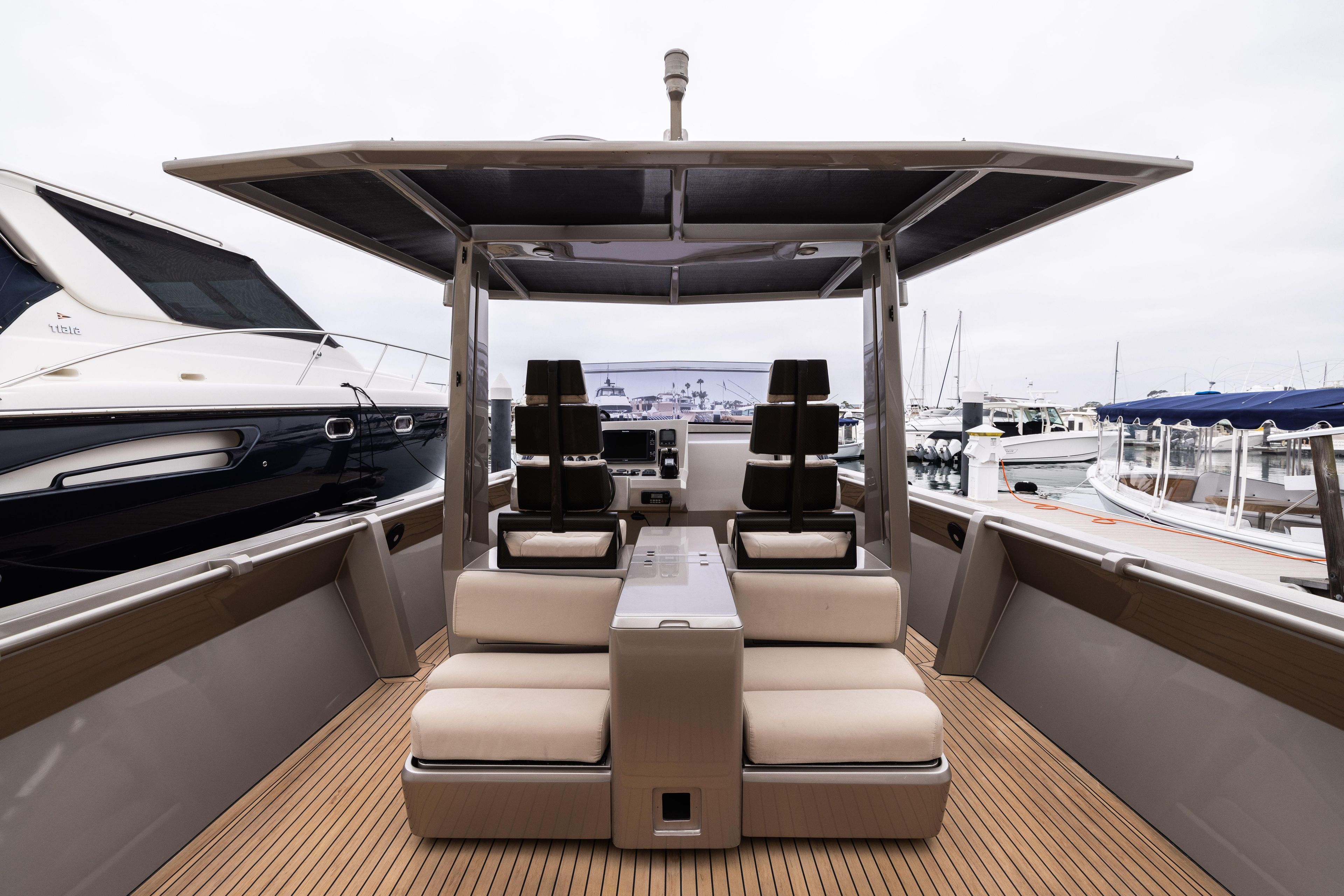 2005 Wally Yachts Tender Express with sleek seating and modern design at a marina.