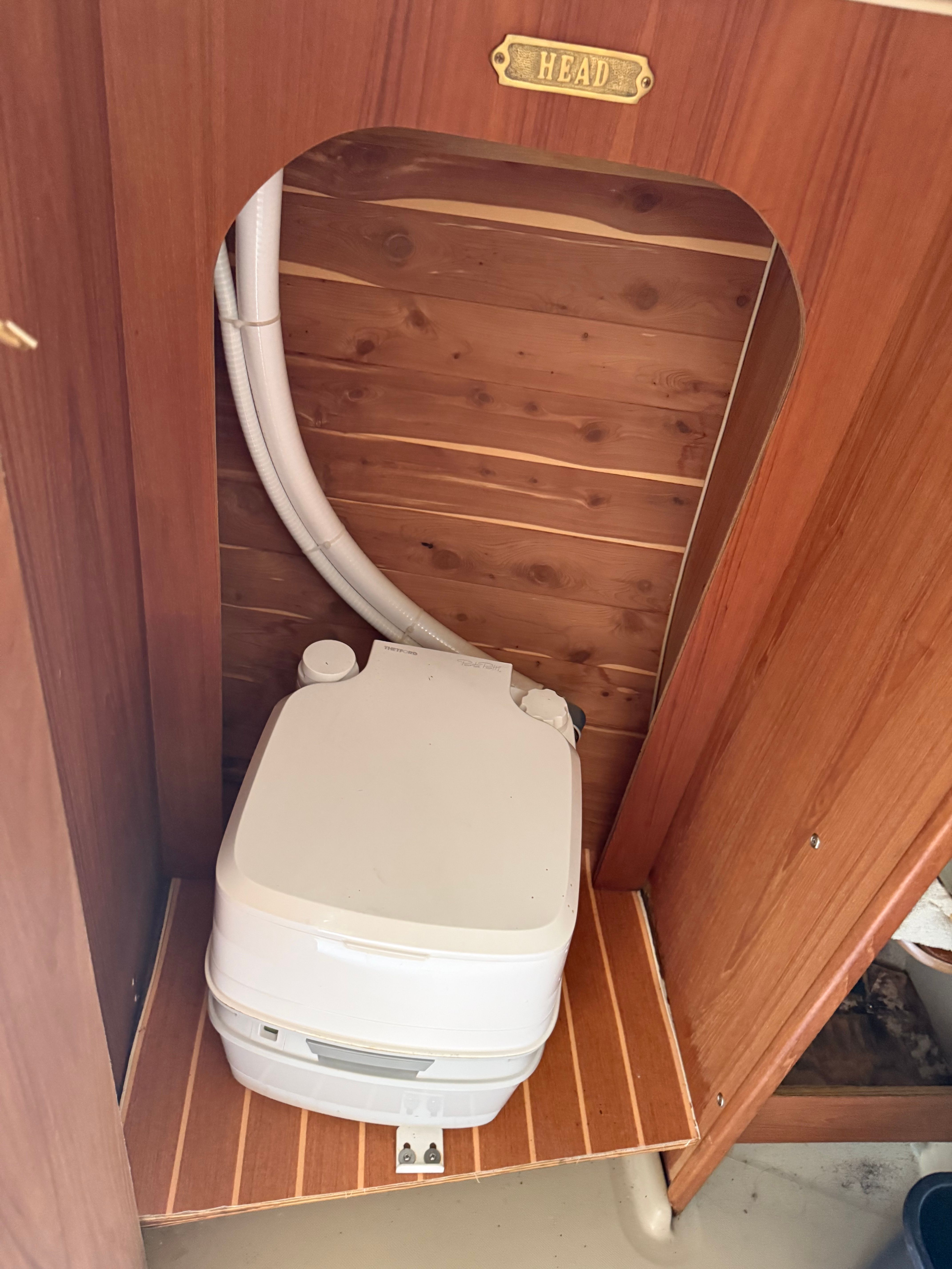Compact bathroom in 1984 O'Day 25 sailboat.