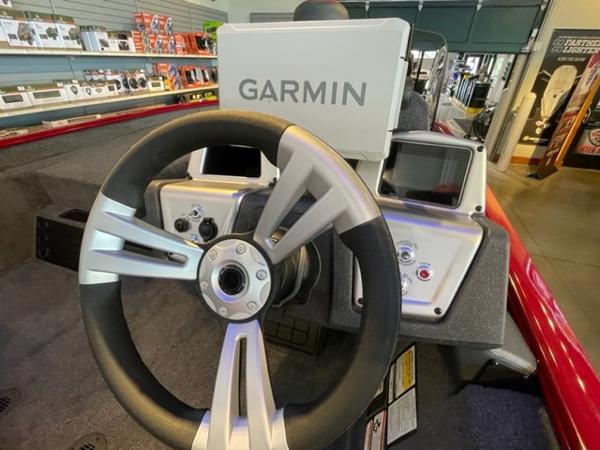 Steering wheel of 2025 Tracker Savage 215 with Garmin navigation system.