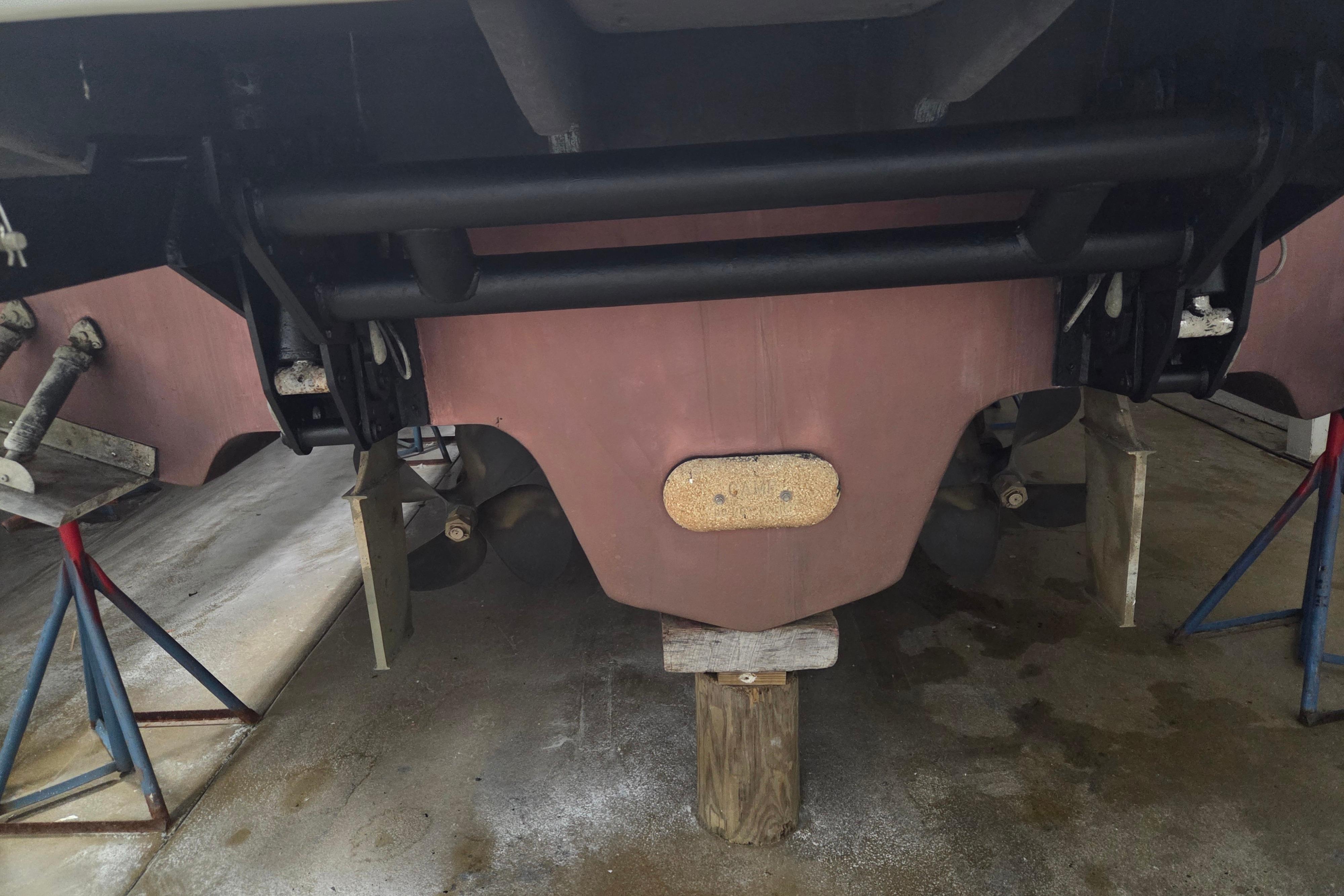 Rear view of a 2000 Sea Ray Sundancer 540 boat on stands.
