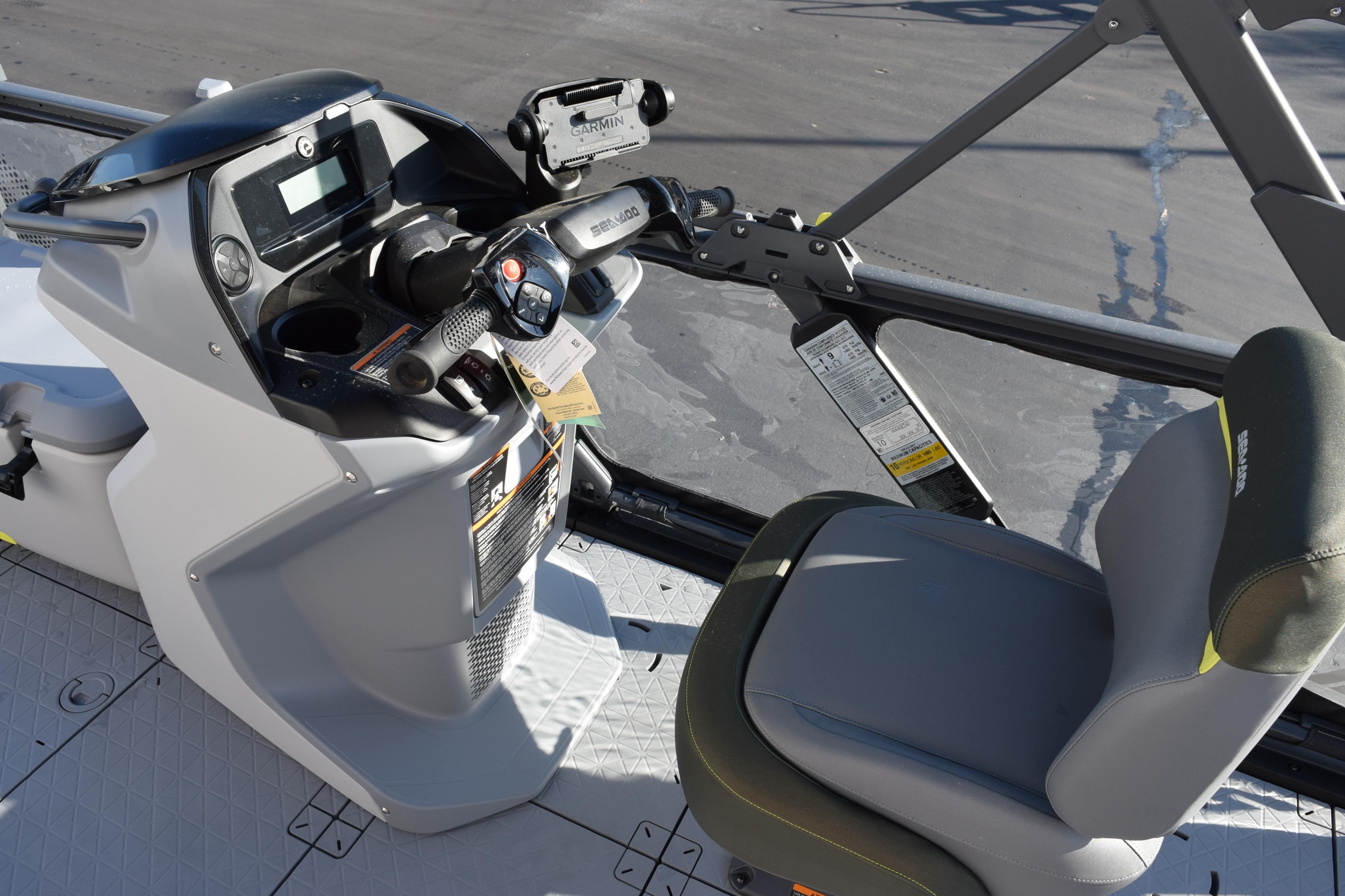 2026 Sea-Doo Switch Fish 21 dashboard and seating area, featuring modern controls and comfortable seating.