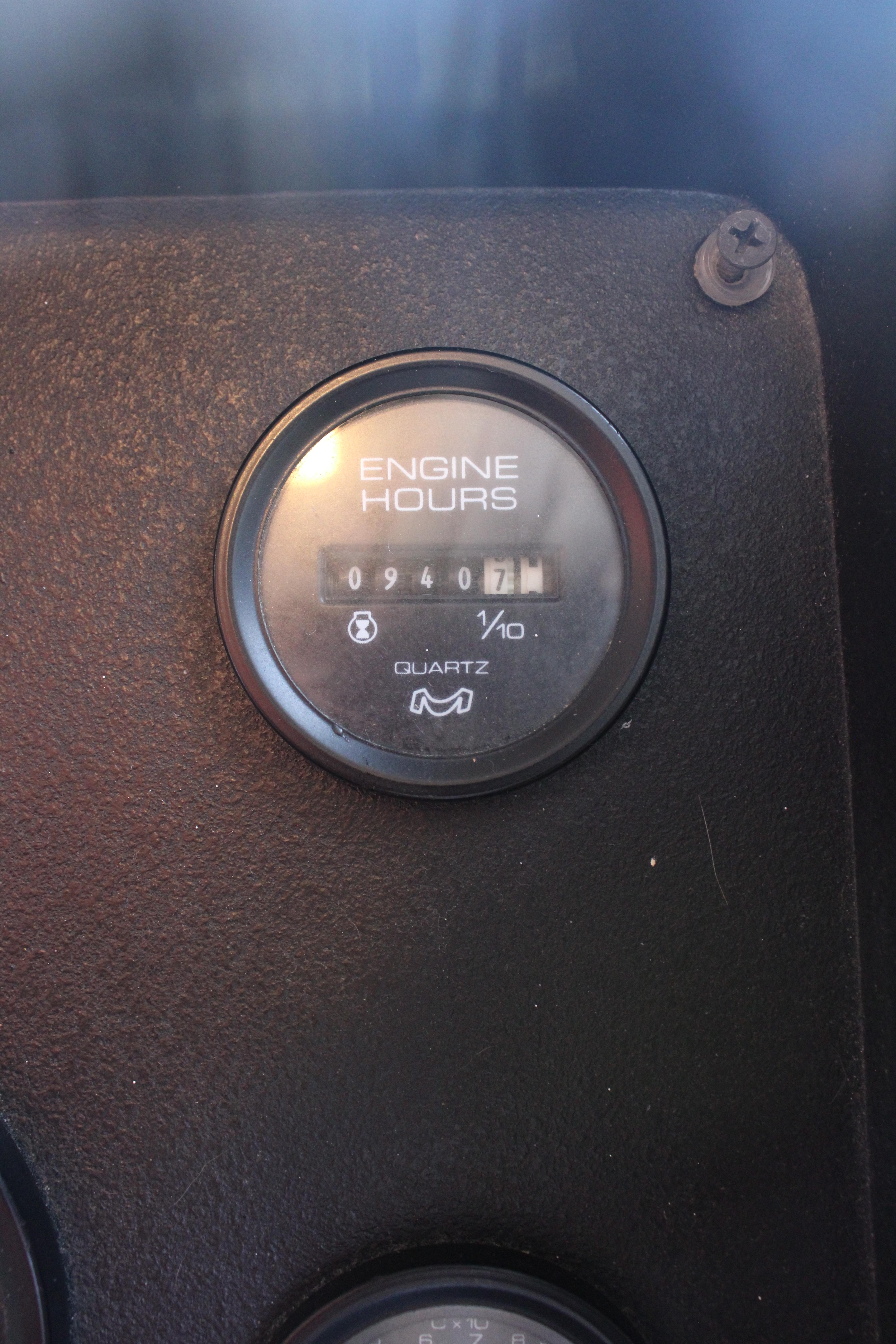 Engine hour meter showing 940.7 hours on 1992 Sumerset 66 boat.