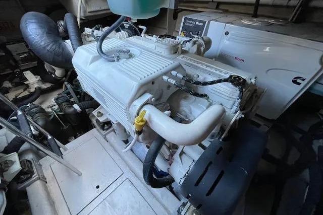 Engine room of a 2016 Sea Ray Sundancer 510 yacht, showcasing mechanical components.