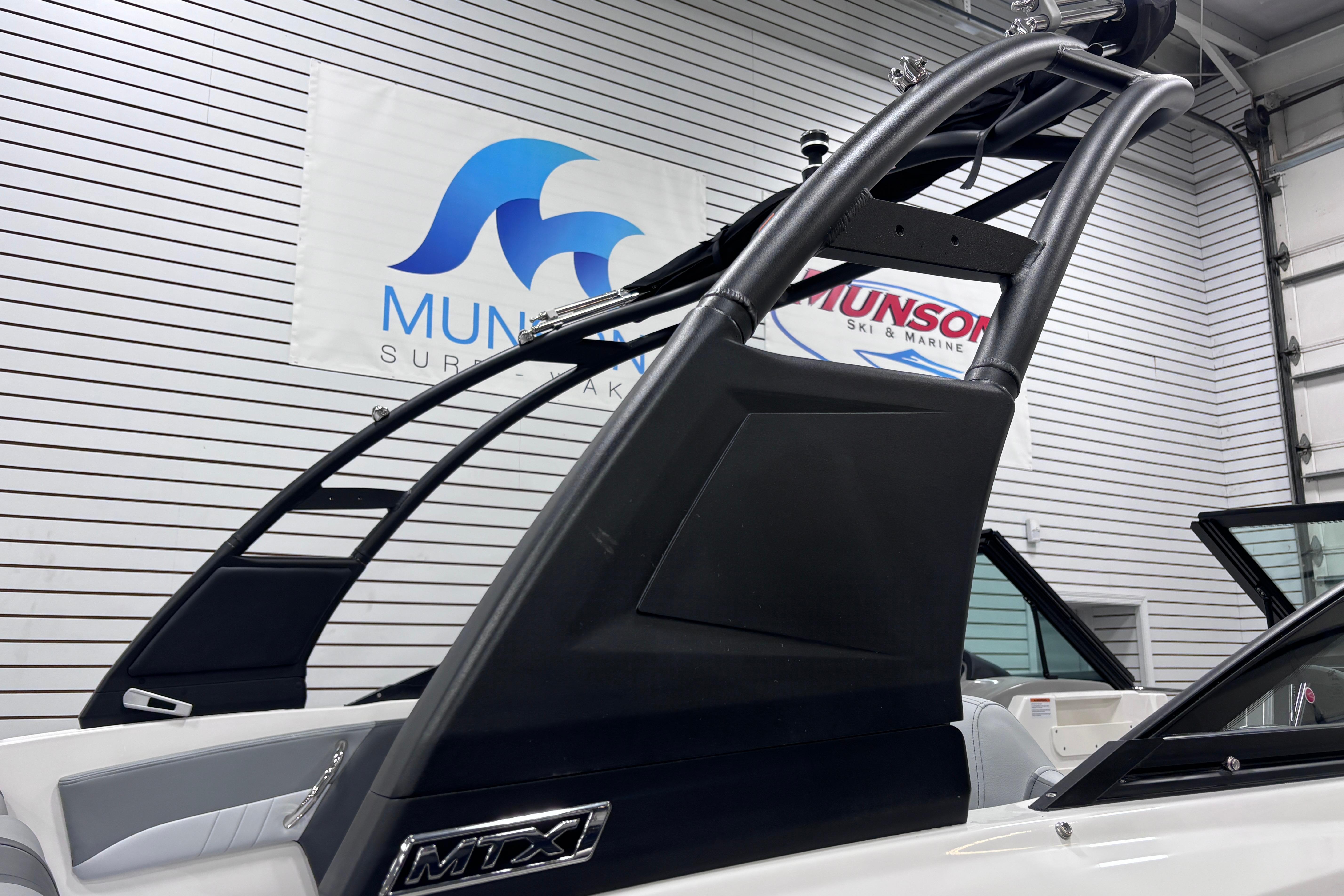 2026 Chaparral 21 SSi boat with MTX tower in showroom.