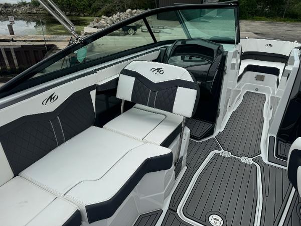 2018 Monterey 258 Super Sport boat interior with sleek black and white seating and modern design.