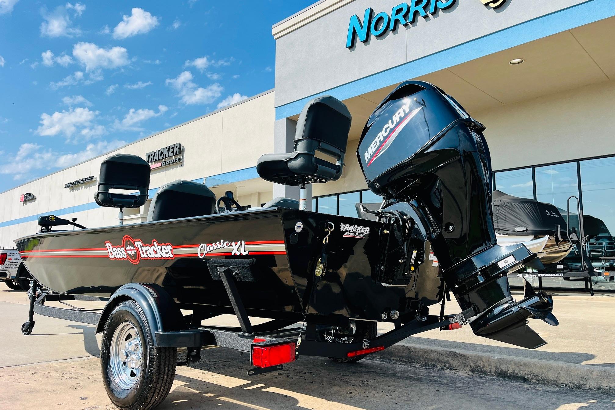 2026 Tracker Bass Tracker Classic XL boat with Mercury engine at dealership.