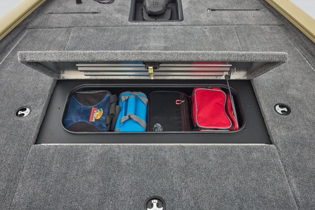 Storage compartment of 2026 Tracker Pro Team 195 boat with organized gear bags.