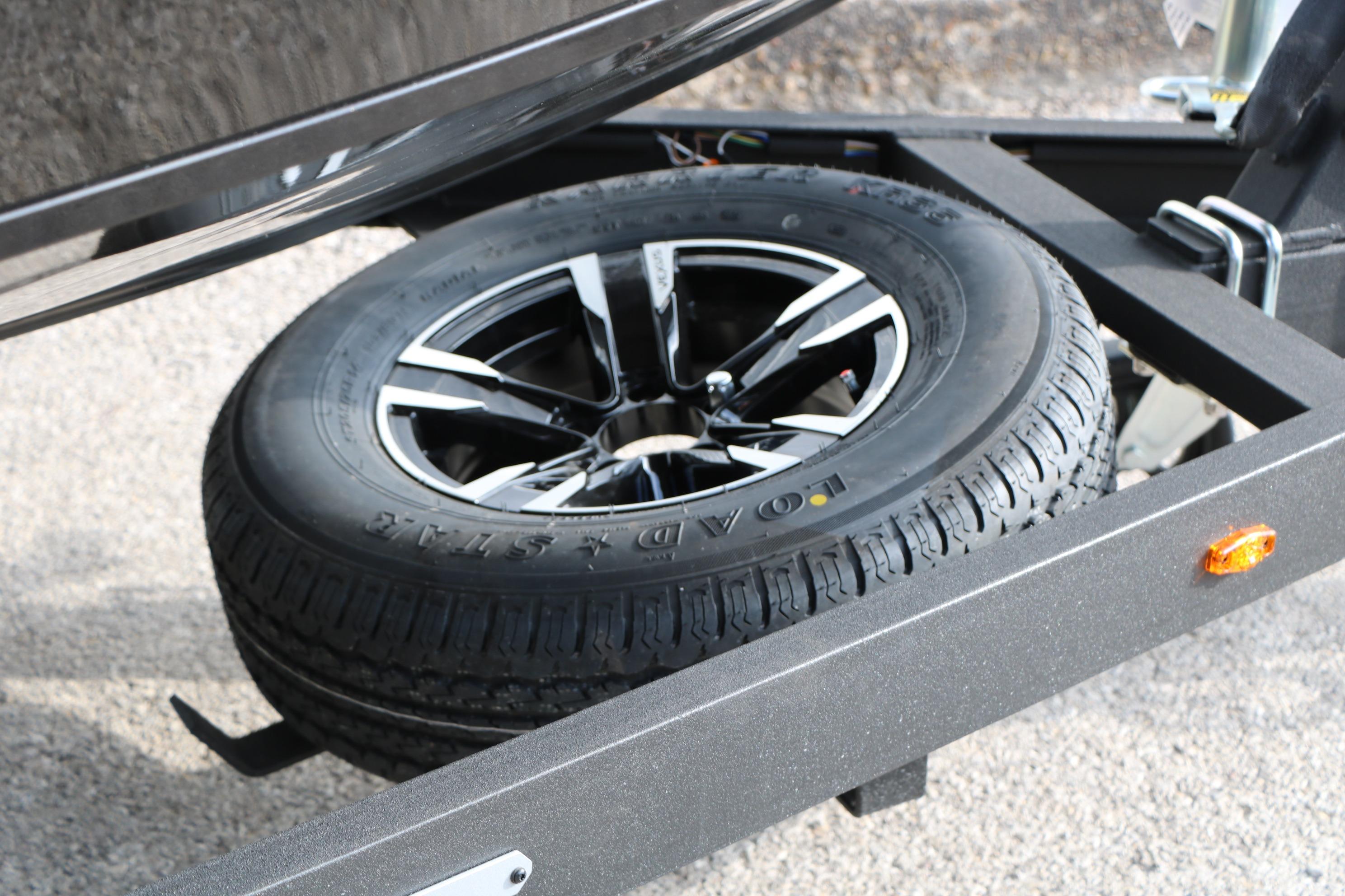 Spare tire mounted on a 2026 Vexus ADX 190 trailer frame.