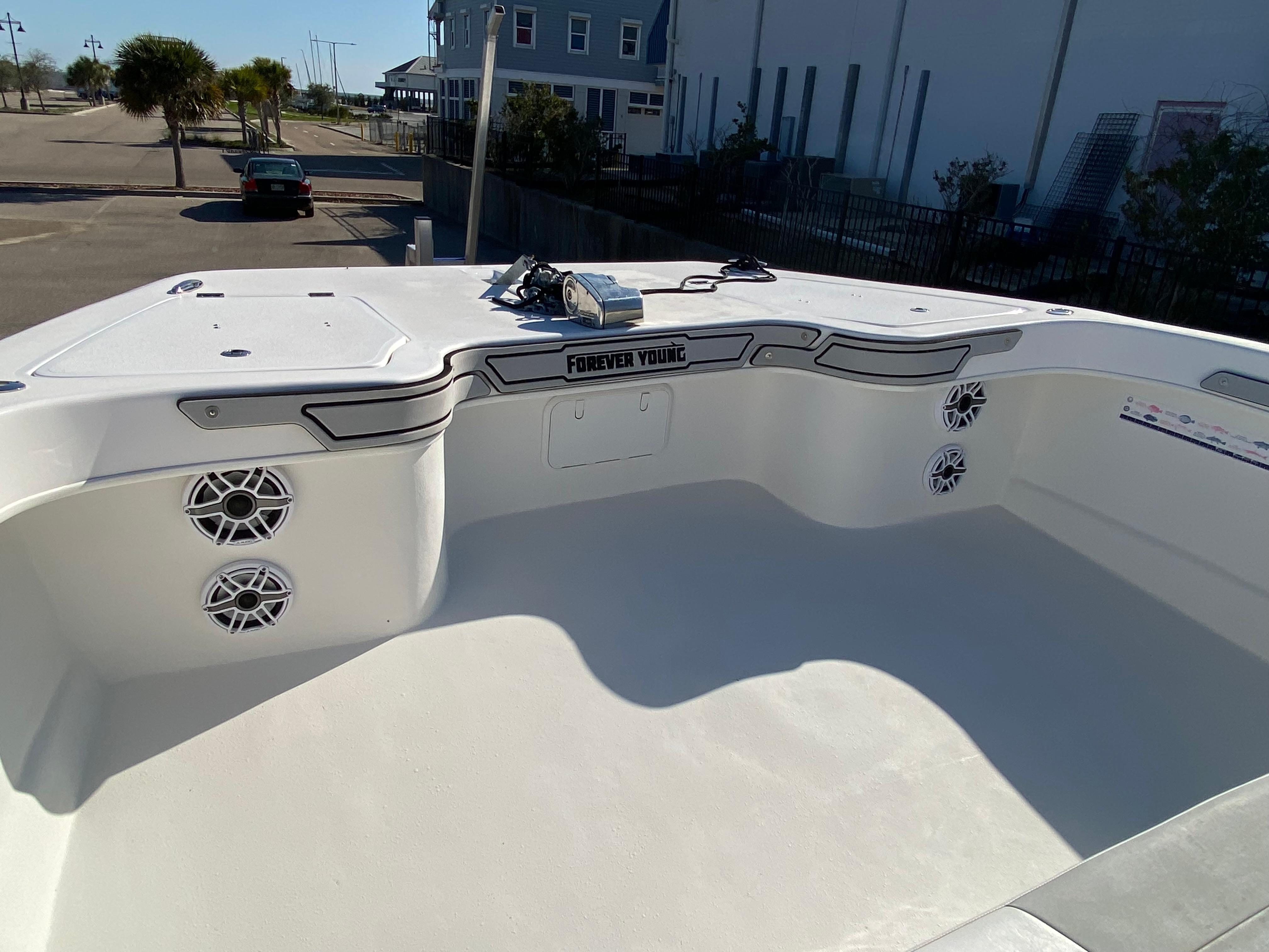 2021 Twin Vee 36 Center Console boat interior with speakers and storage compartments.