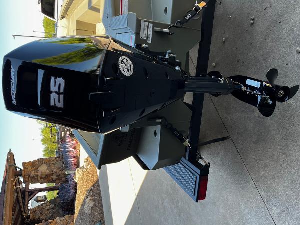 2025 Tracker Grizzly 1650 T Prairie Wings Edition with Mercury 25 outboard motor.