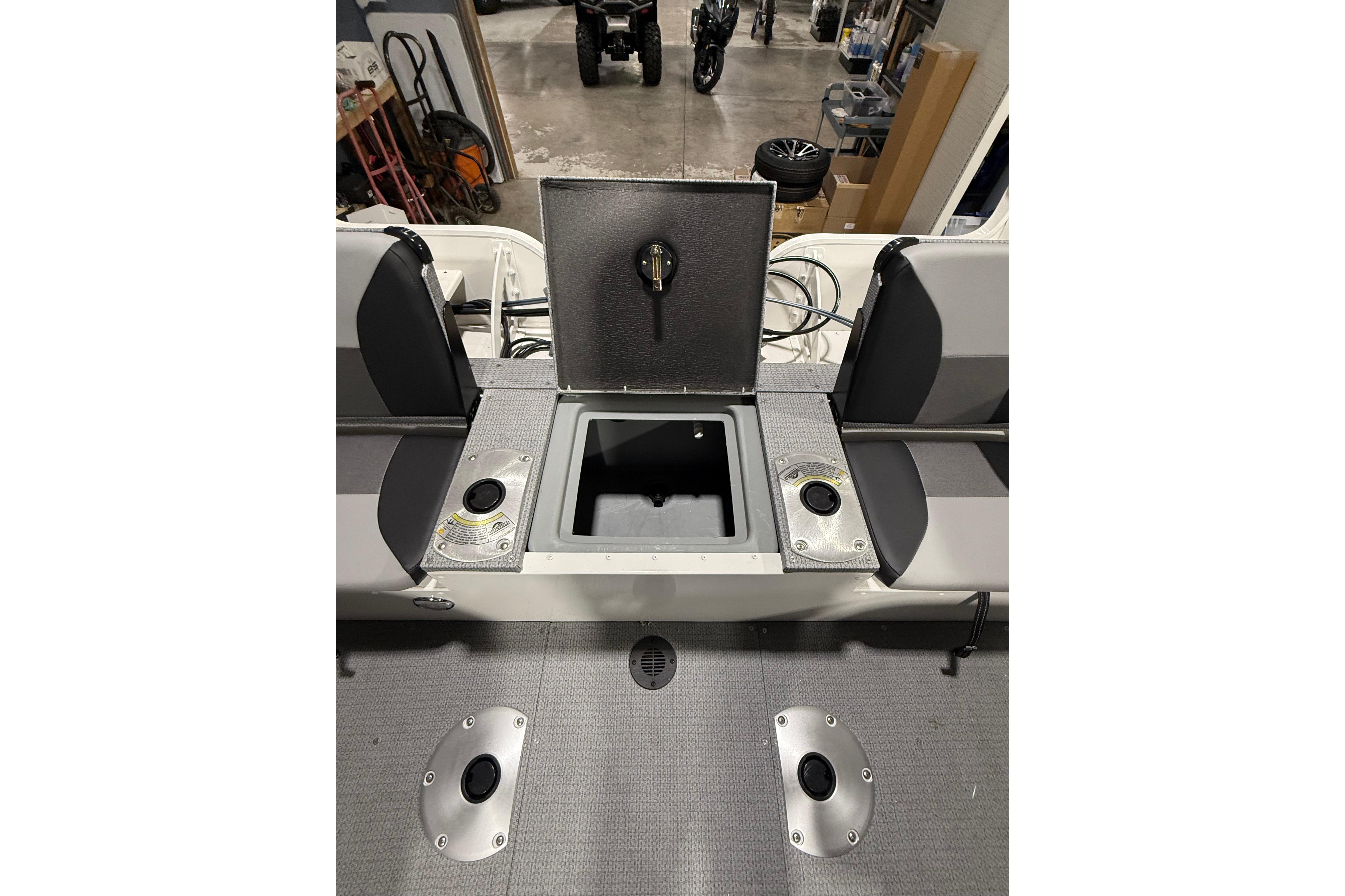 2025 G3 Angler V1850 SF boat interior with storage compartment open.