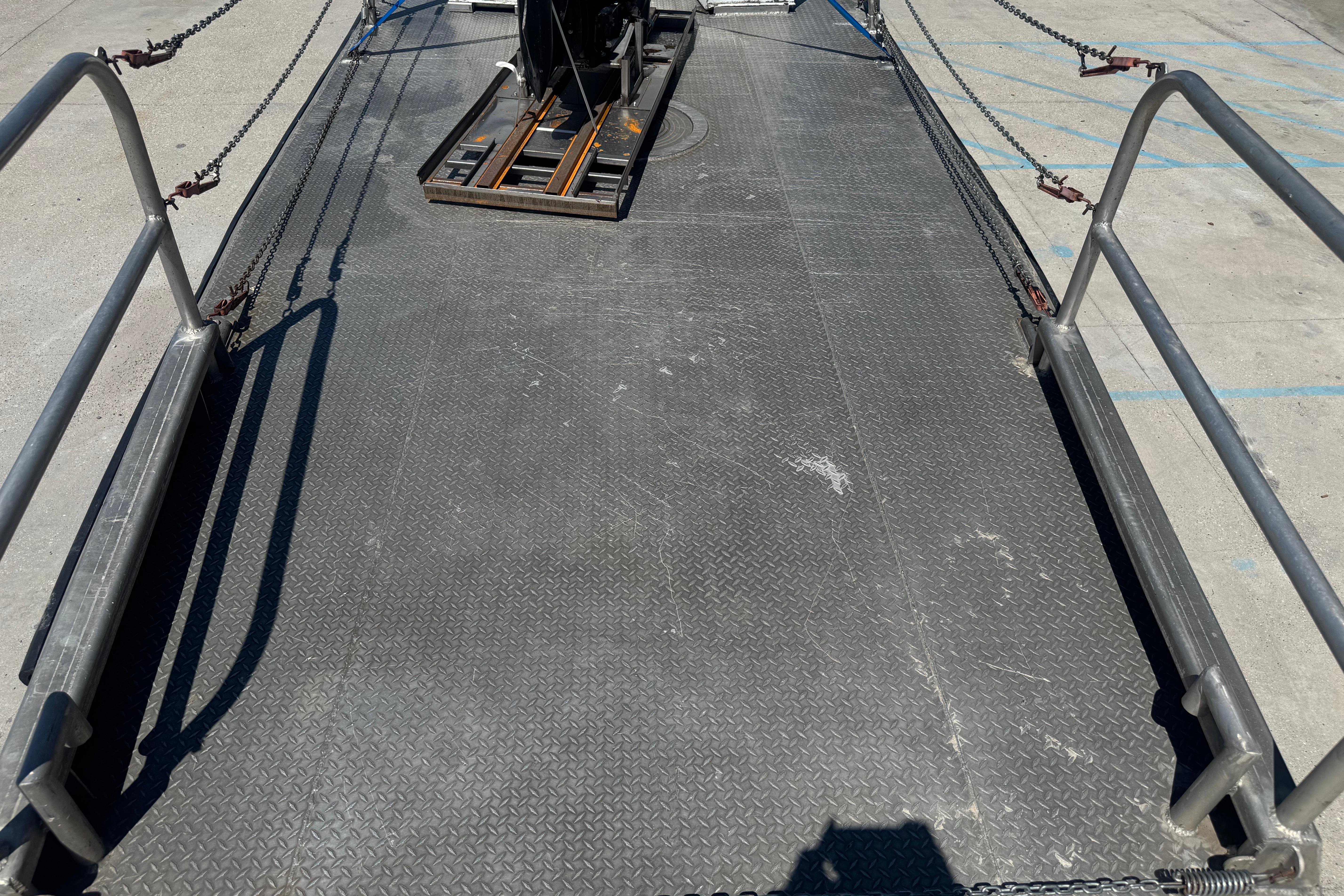 Aluminum Work Boat 33 deck with railings and chains, 2010 model.
