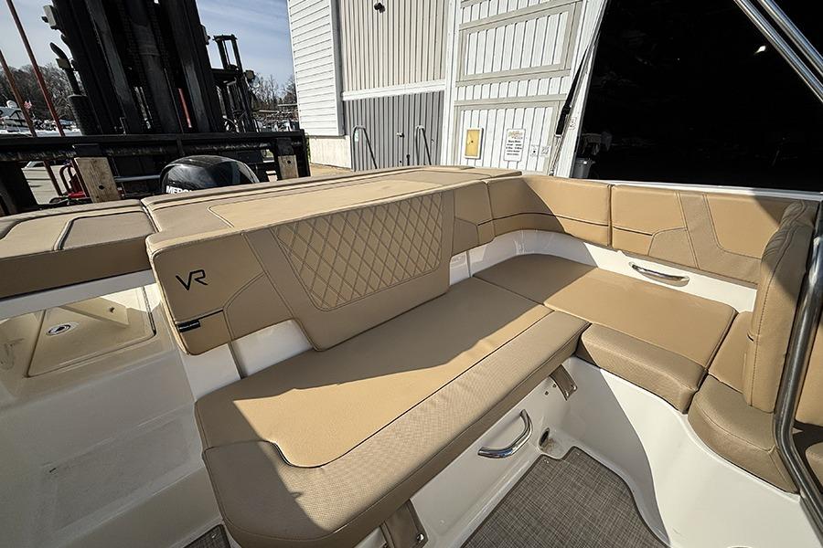 2023 Bayliner VR5 Bowrider OB interior with tan seating and modern design.