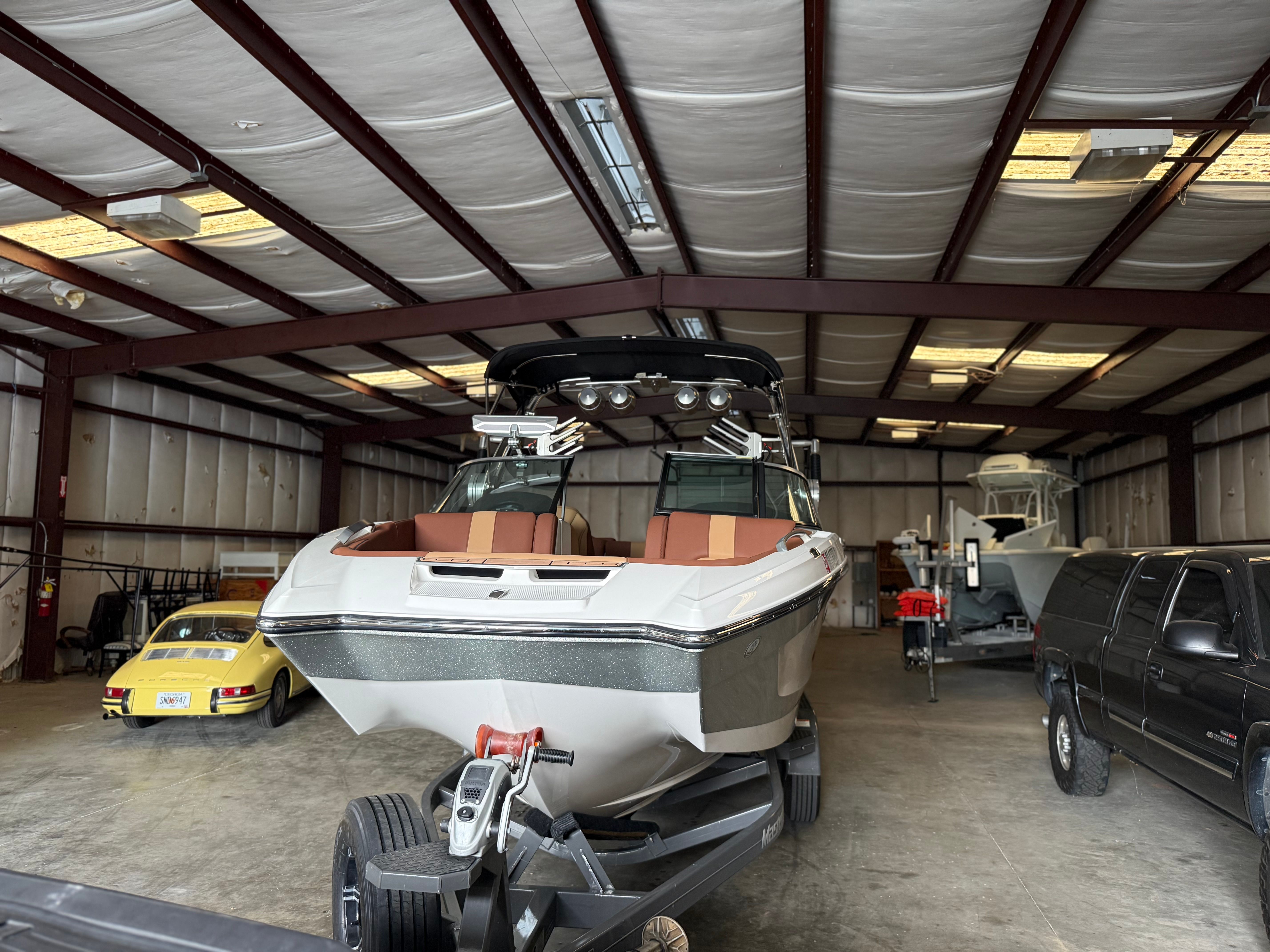 2021 MasterCraft X24 in a storage facility.