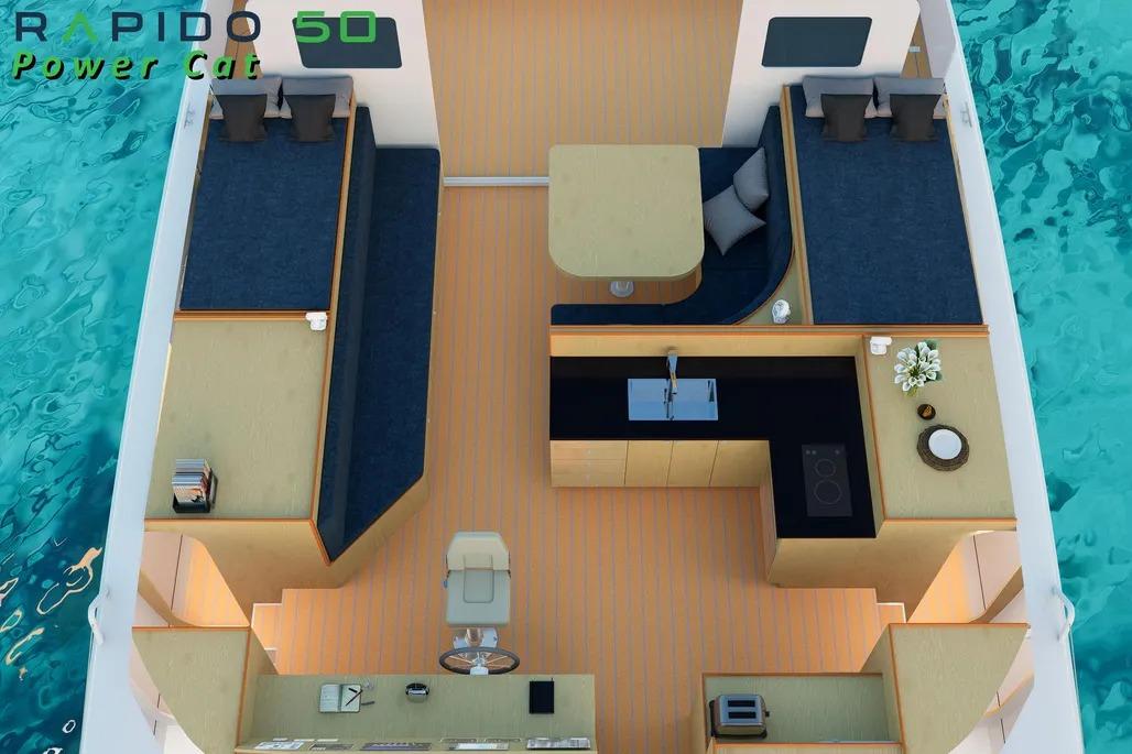 Interior view of 2025 Rapido 500 ECO Power Cat, featuring modern kitchen and seating areas.